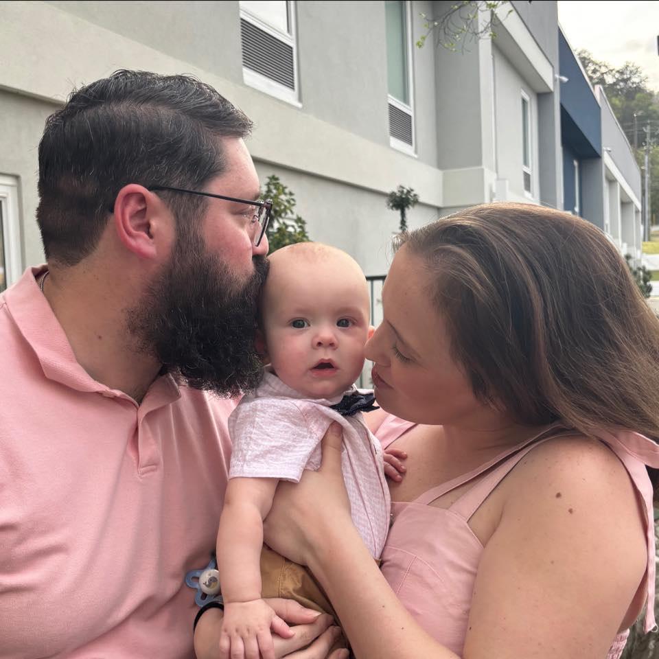 Mama and Dada love their little man!