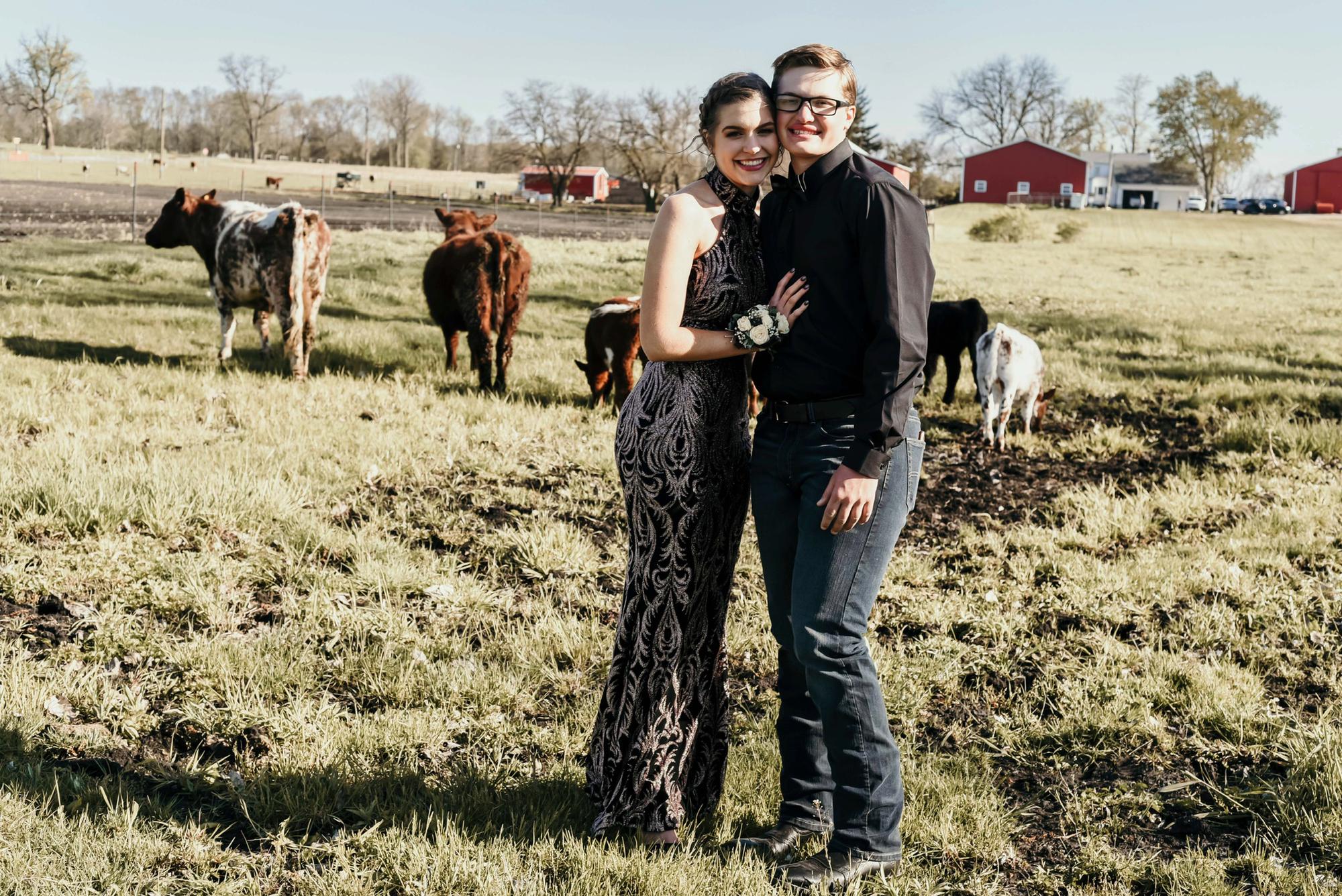 Still prom and yes we did get pictures taken with some of our favorite cows at Josh's house! May 9, 2020