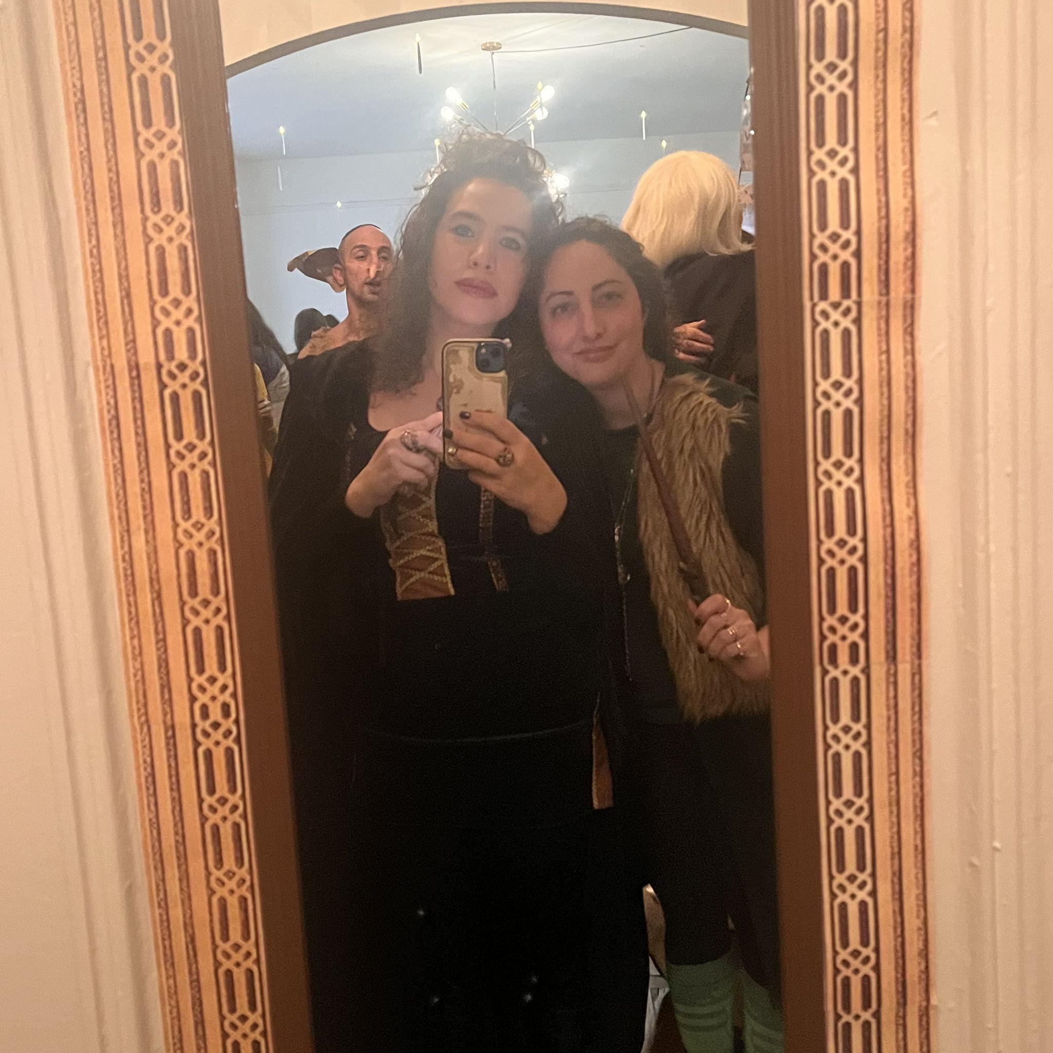 At this party, a friend who shall not be named accidentally set Shosh's head on fire. Lauren put it out with her bare hands, and that's when Shosh knew she had to marry her.