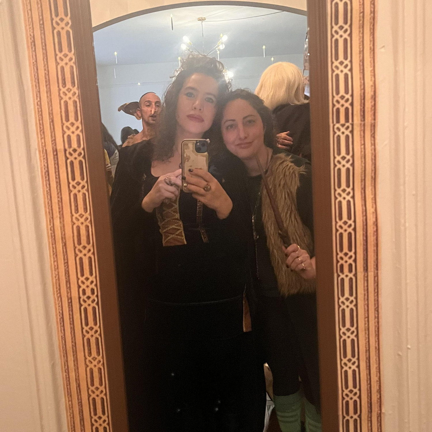 At this party, a friend who shall not be named accidentally set Shosh's head on fire. Lauren put it out with her bare hands, and that's when Shosh knew she had to marry her.