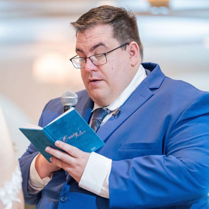 Craig reading his vows. Alyssa cried.