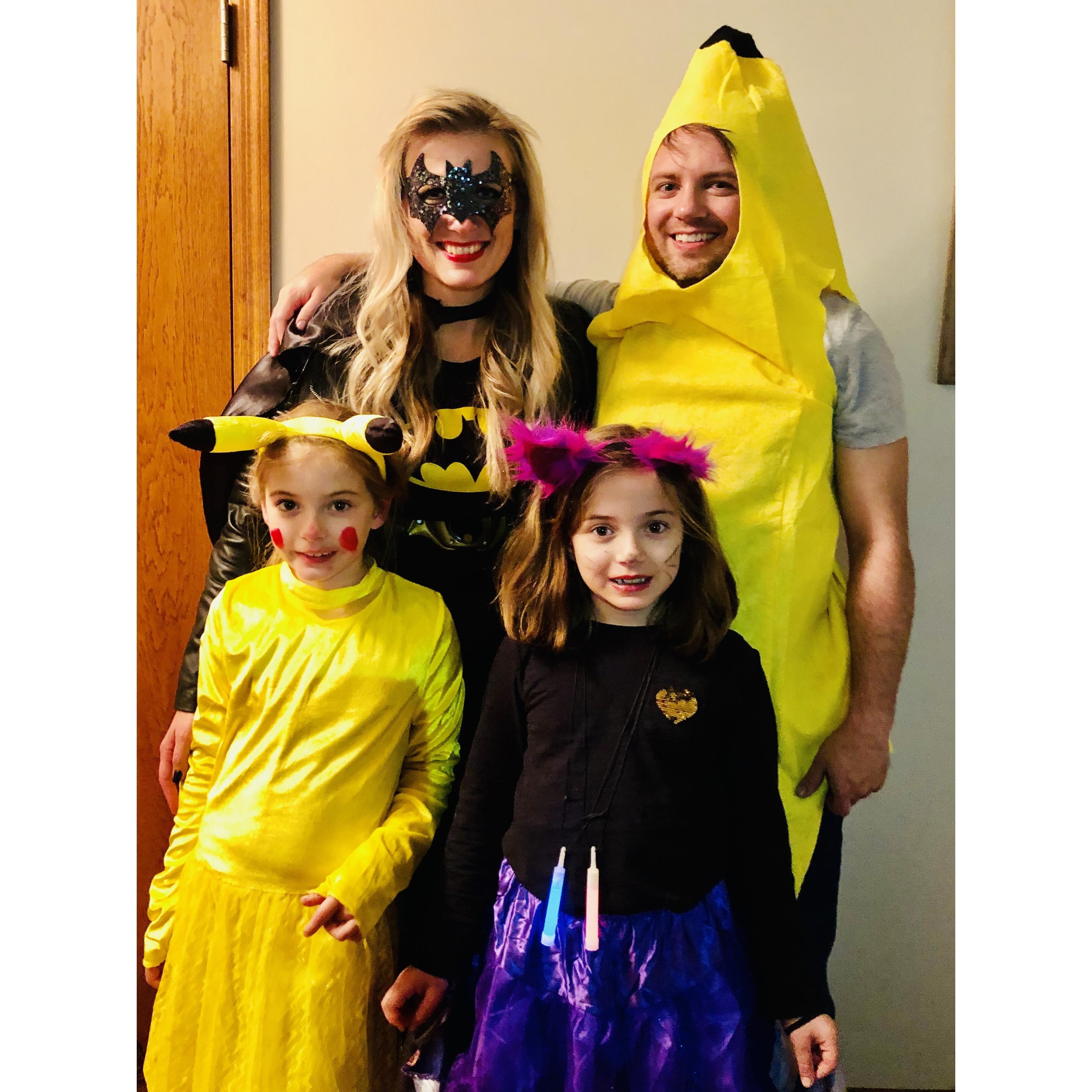 Halloween with Pikachu, a vampire kitty, Bat Girl, and a banana