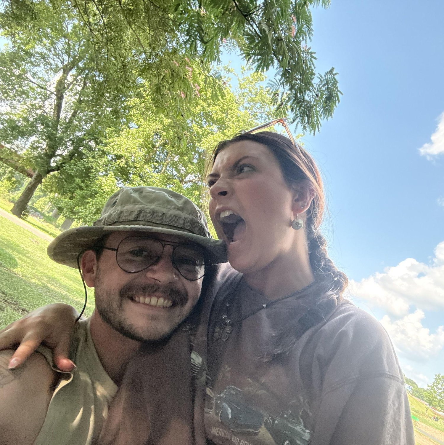 Trying to bite that hat off him