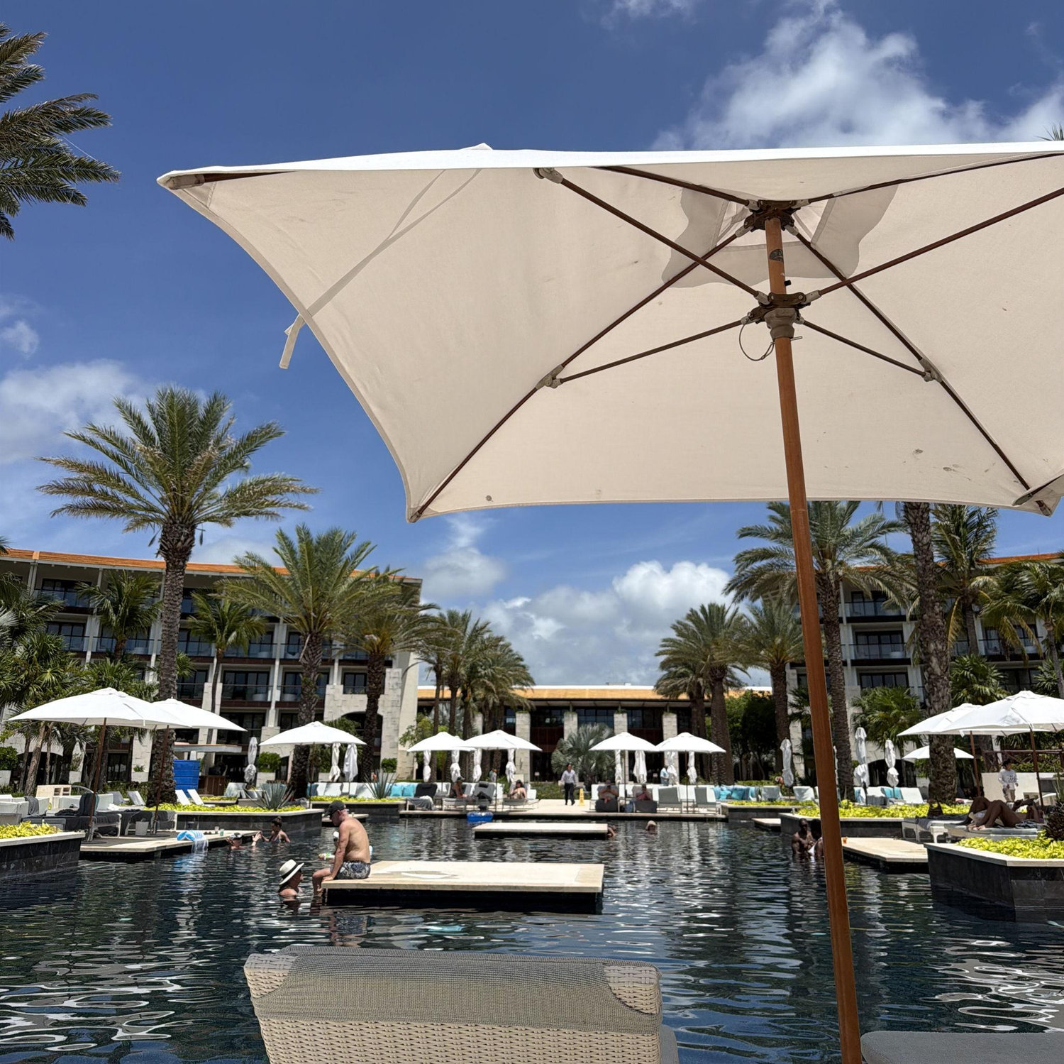 Next to social pool! No swim-up but very relaxing!
