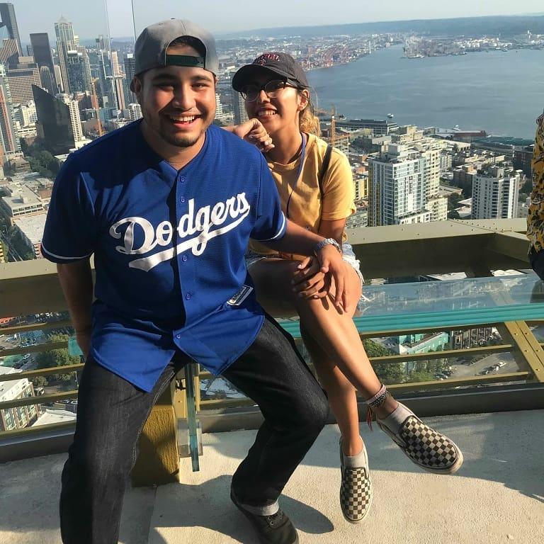 Gio is afraid of heights but loves Sheila enough to visit the space needle. #2018