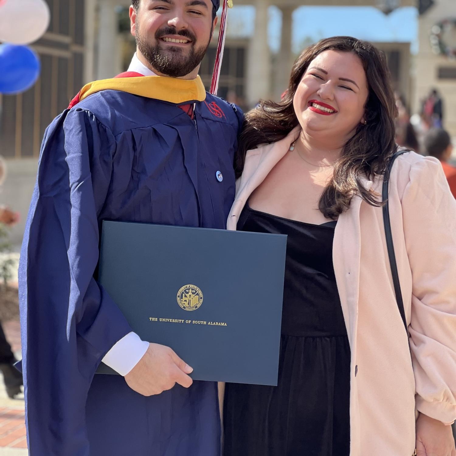 Scotty graduated with his Master's in Occupational Therapy degree in December 2023, with Lauren as his biggest supporter!