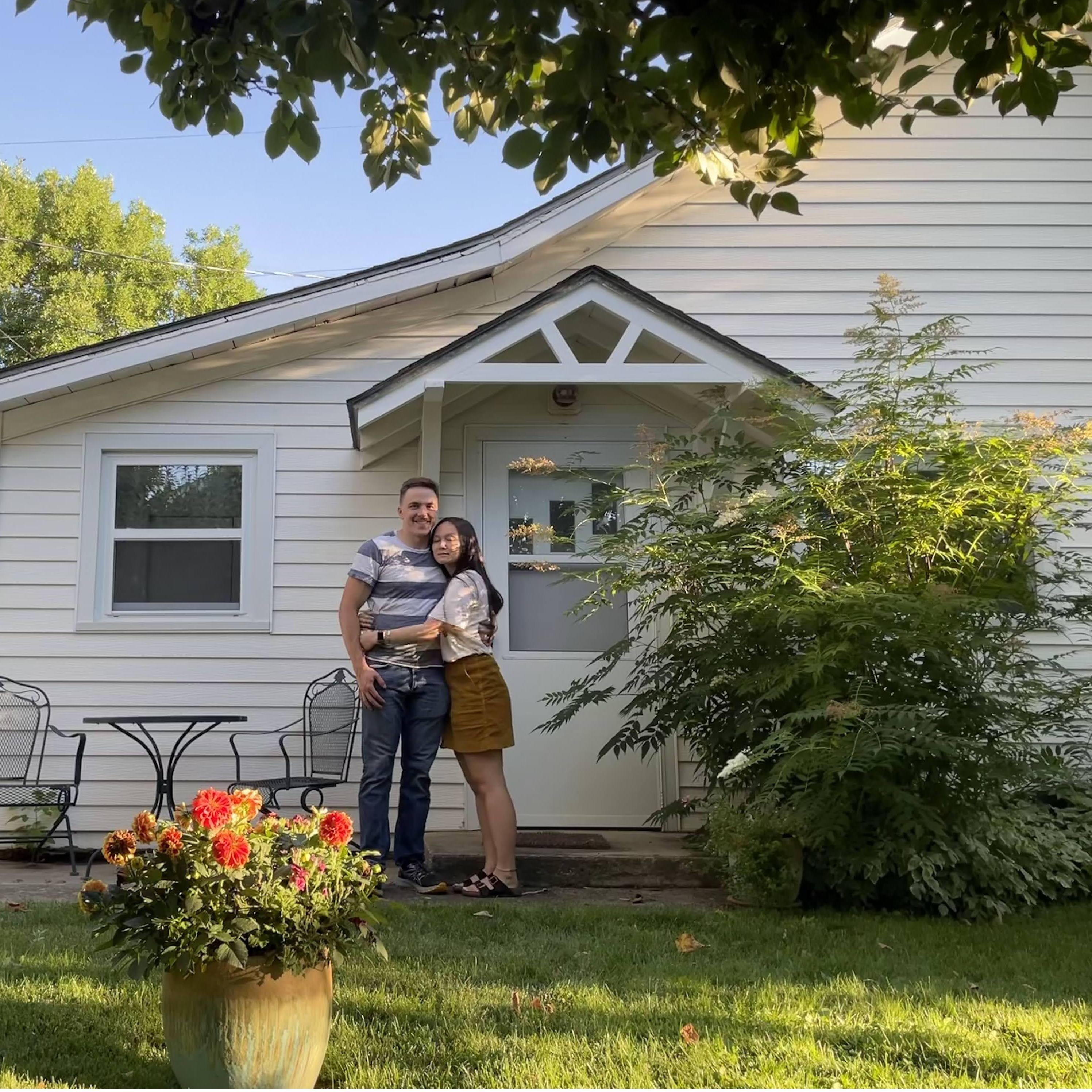Us in front of Francie's (magical) backyard cottage, where we lived for a summer in Cody. Our first home as a couple!