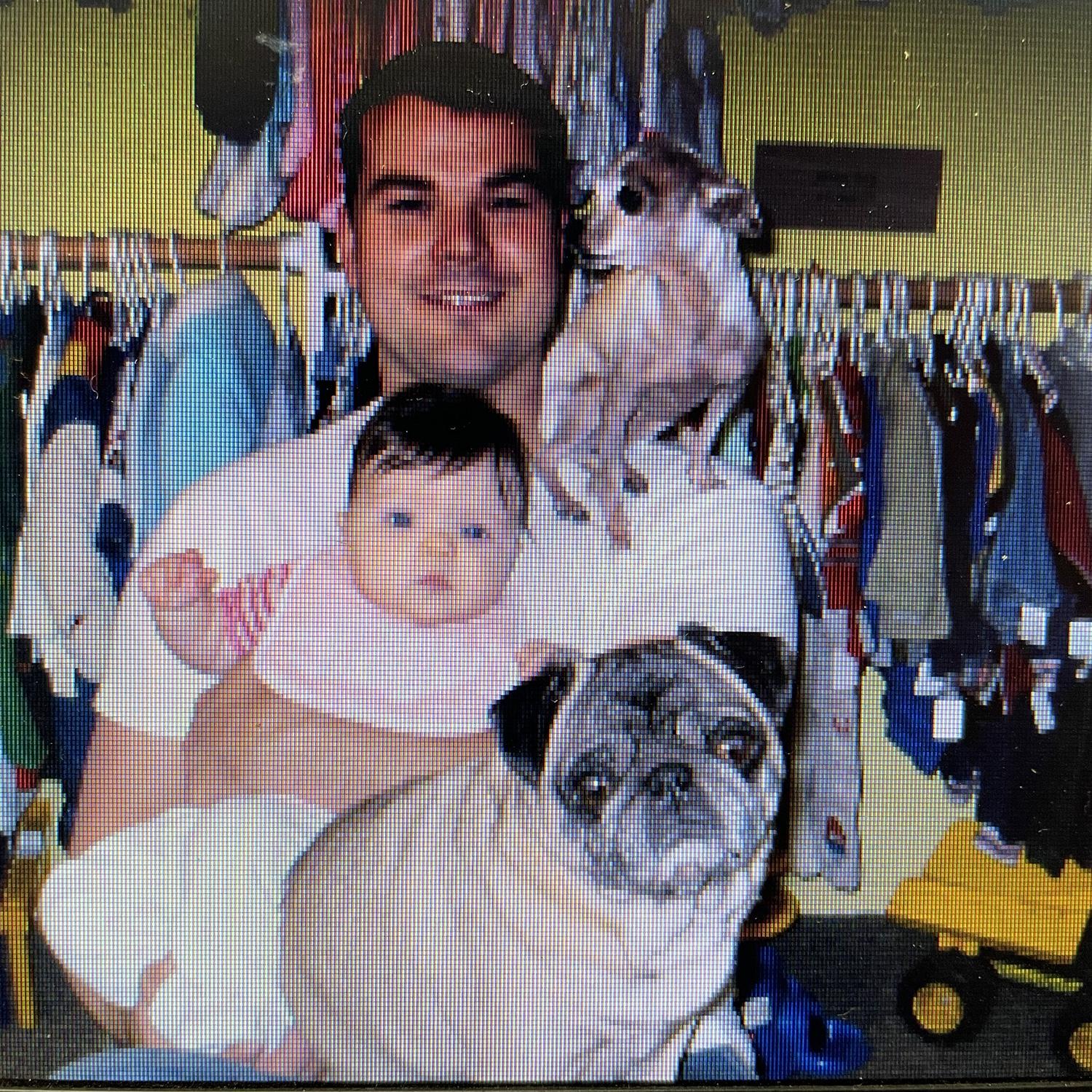 Adam, Jazzman (the chihuahua who lived to 18), Lilly (the stinky pug), and Baby Madison