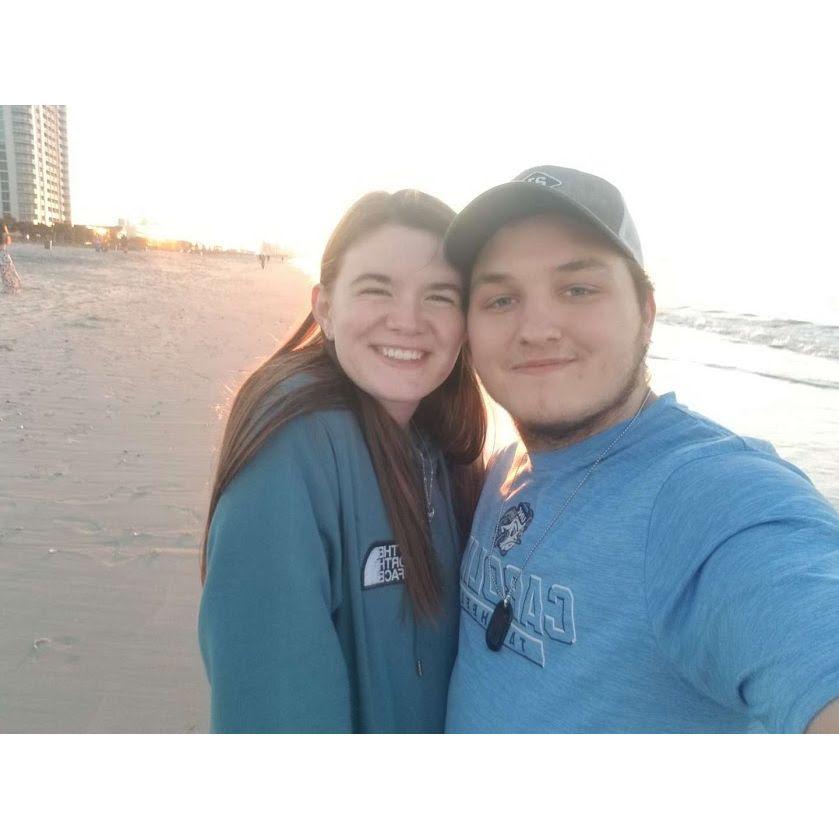 Our walk on the beach, we watched a proposal happen right after taking this photo.