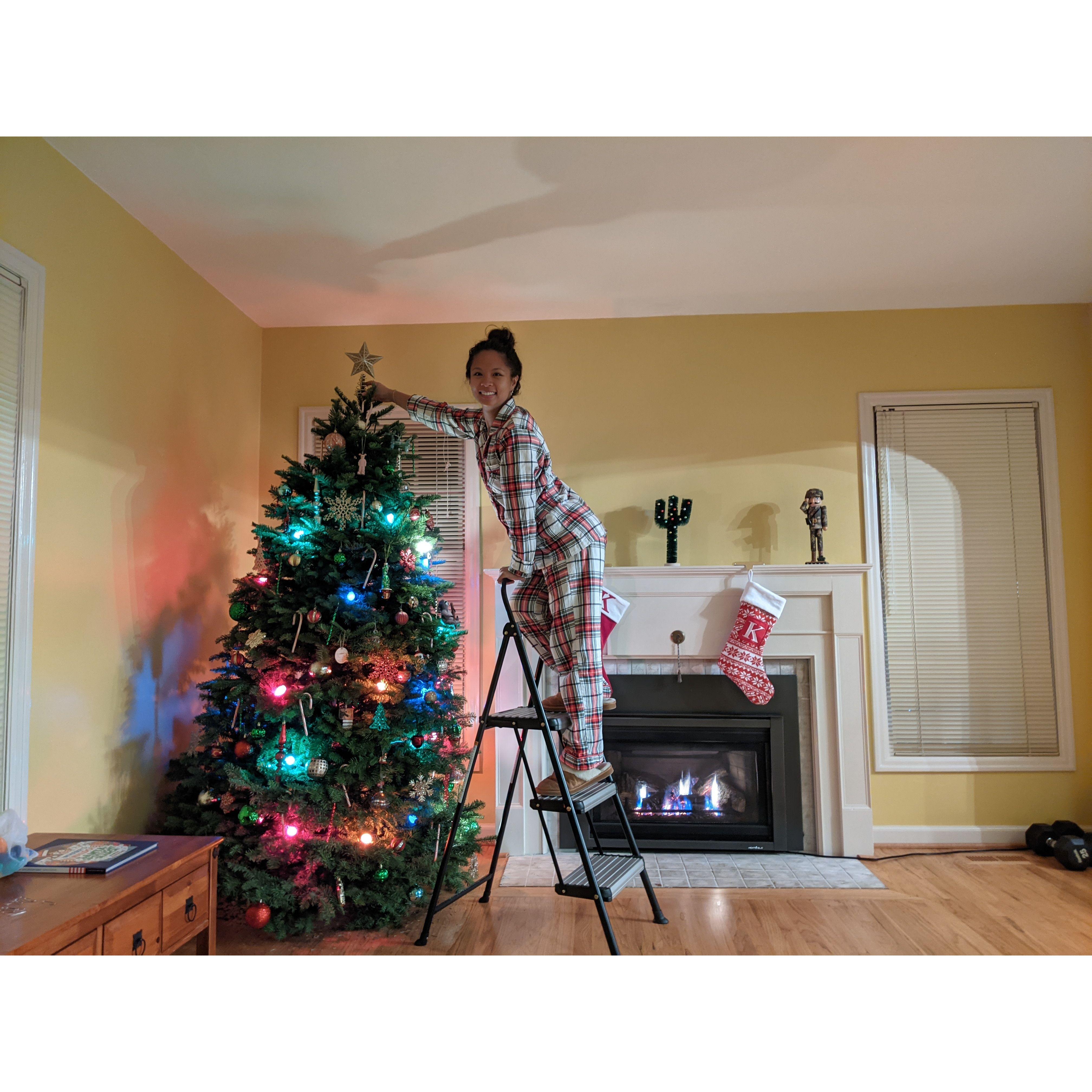 Placing the perfect star- did you know how much this girl loves Christmas?!