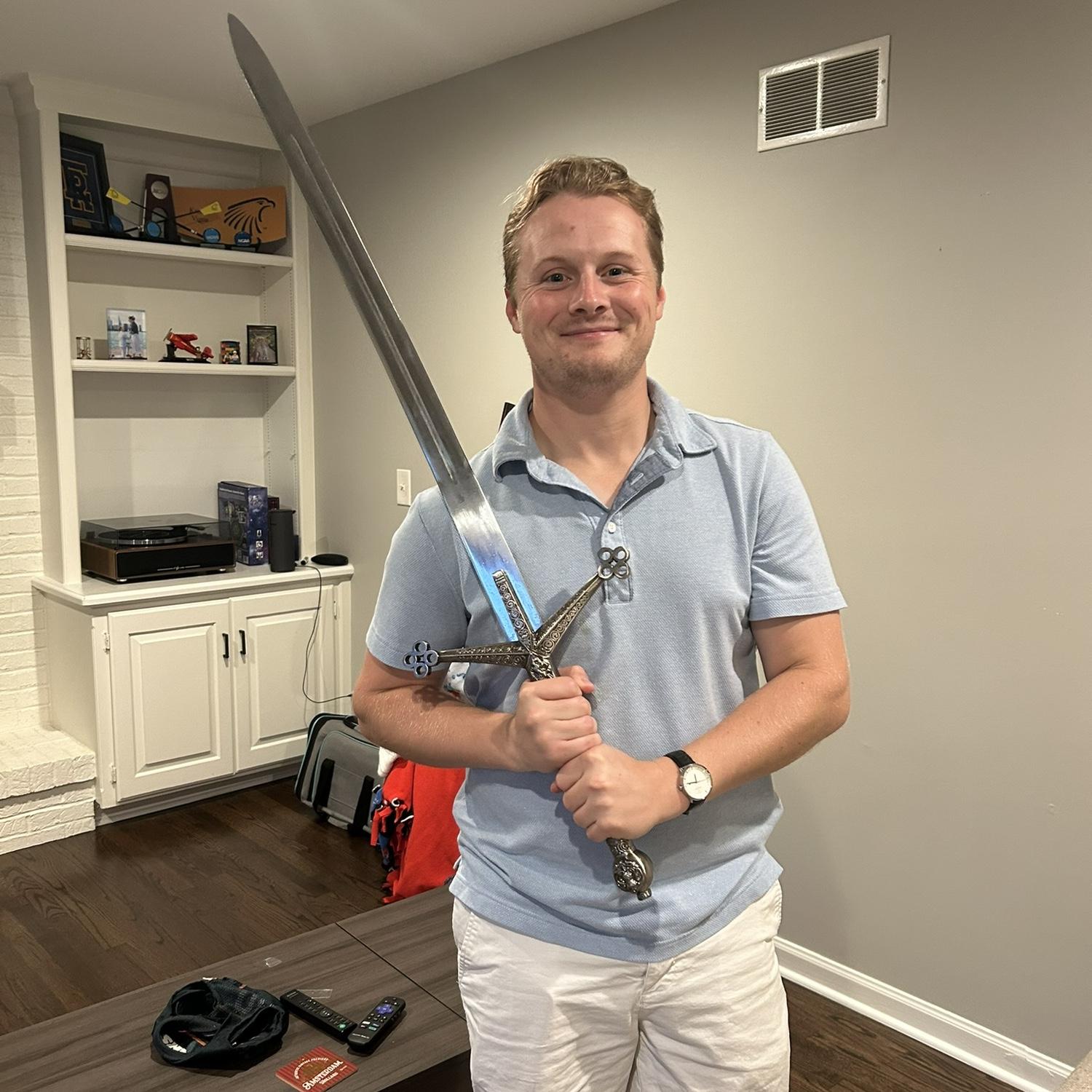 Kristen found out about the tradition of Engagement swords through...you guessed it...reading! Here, Sean is holding his engagement sword from Kristen. Stay tuned for its appearance at the wedding!