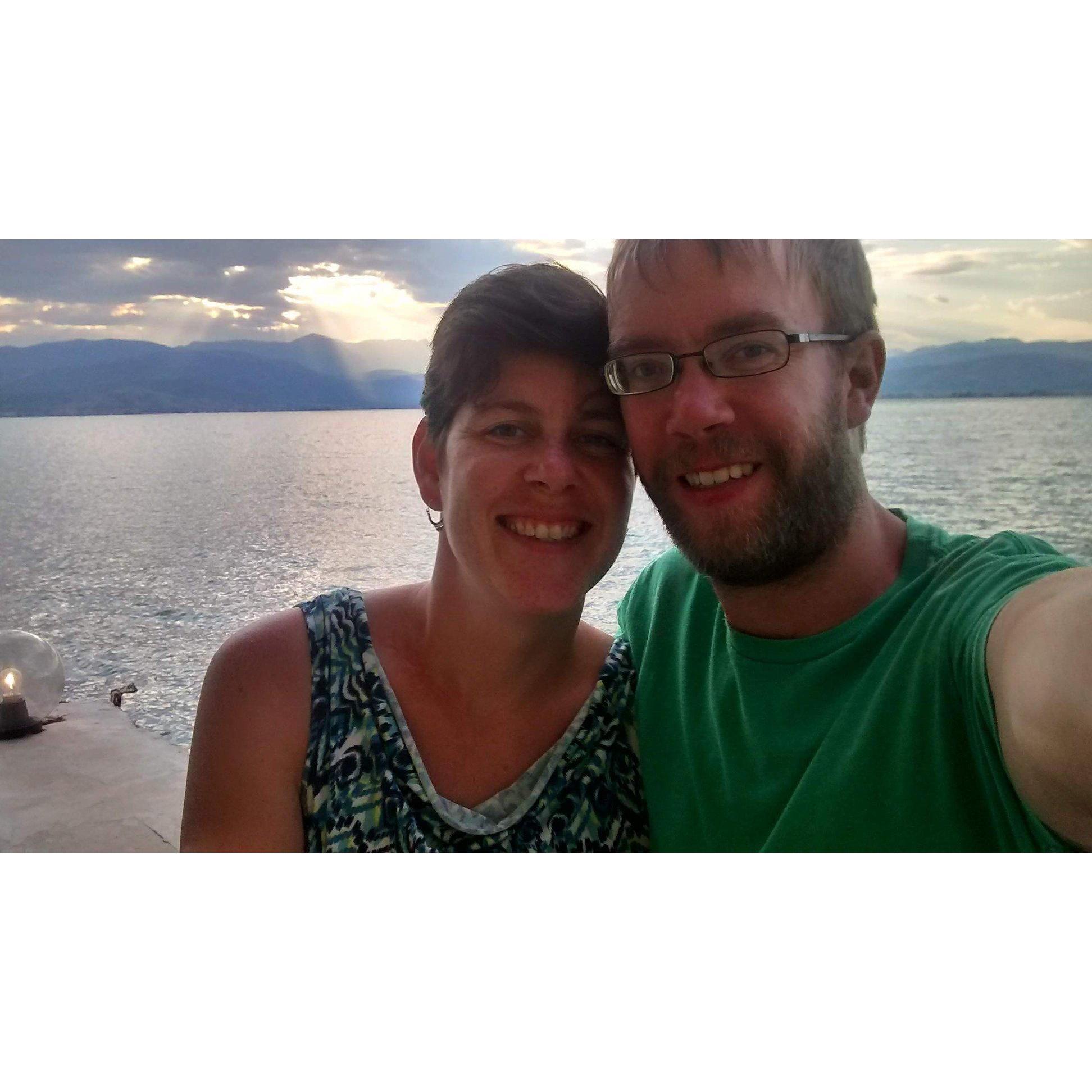 Us at a seaside restaurant in Nafplio, Greece. After eating an utterly delicious meal, before drinking wine and deciding to get married.