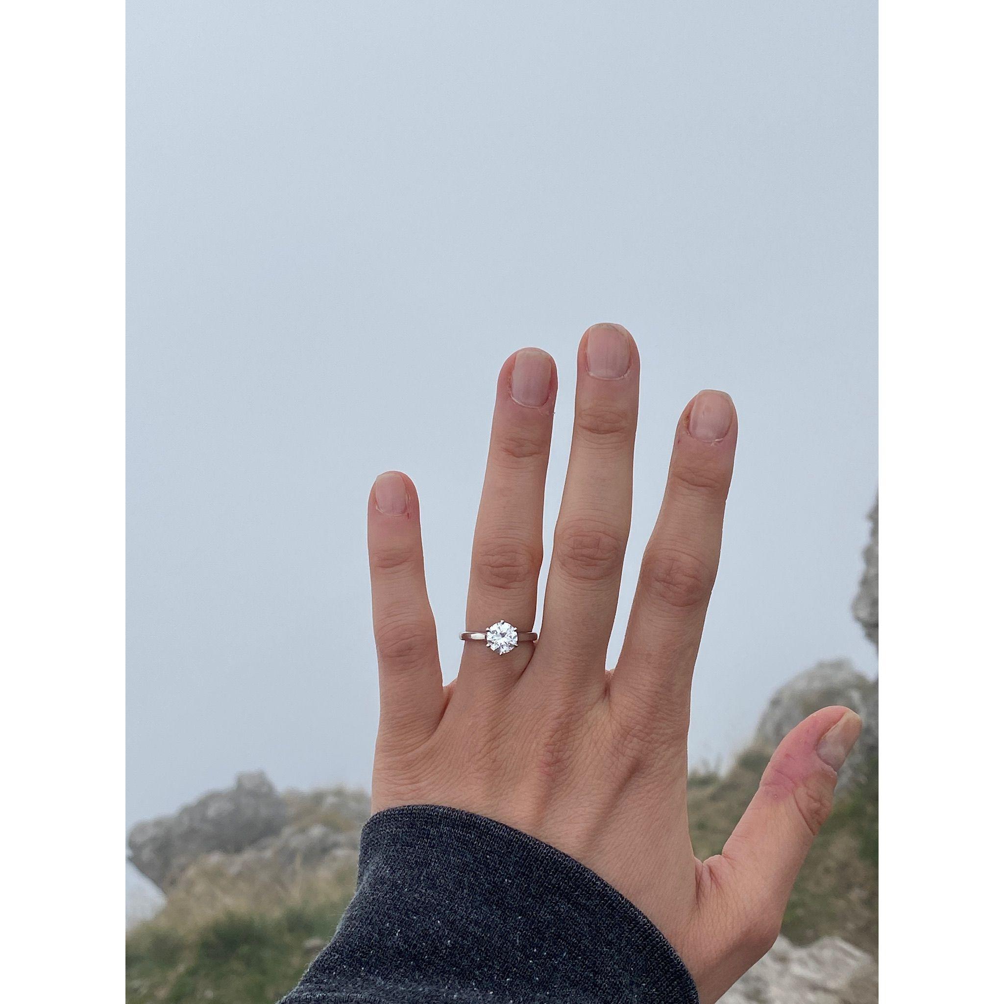 Watching my ring shine on a mountaintop in Lake Como