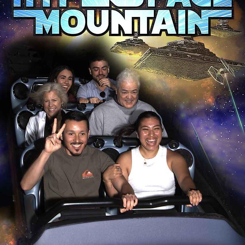 Front row on Space Mountain. Oscar's peace sign cracks me up!