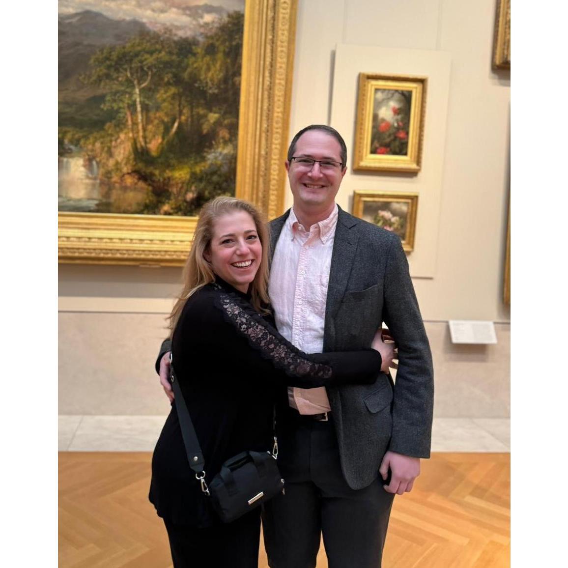 Steven proposed at the Met in front of Jen's favorite painting. The other people in the gallery started clapping!