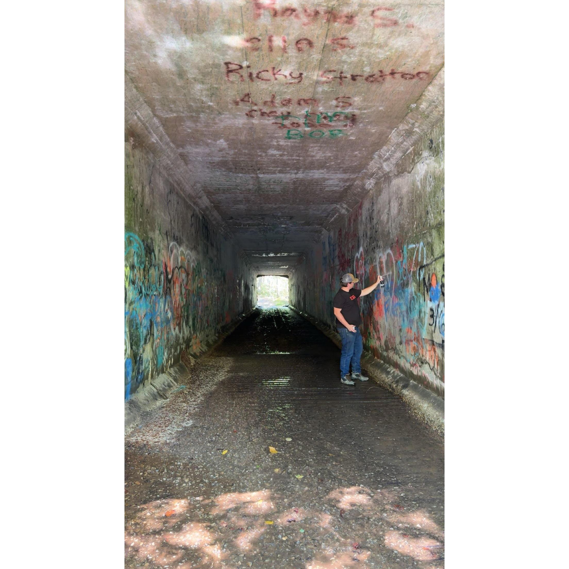 John spraying our engagement in the Enchanted Creek tunnel.