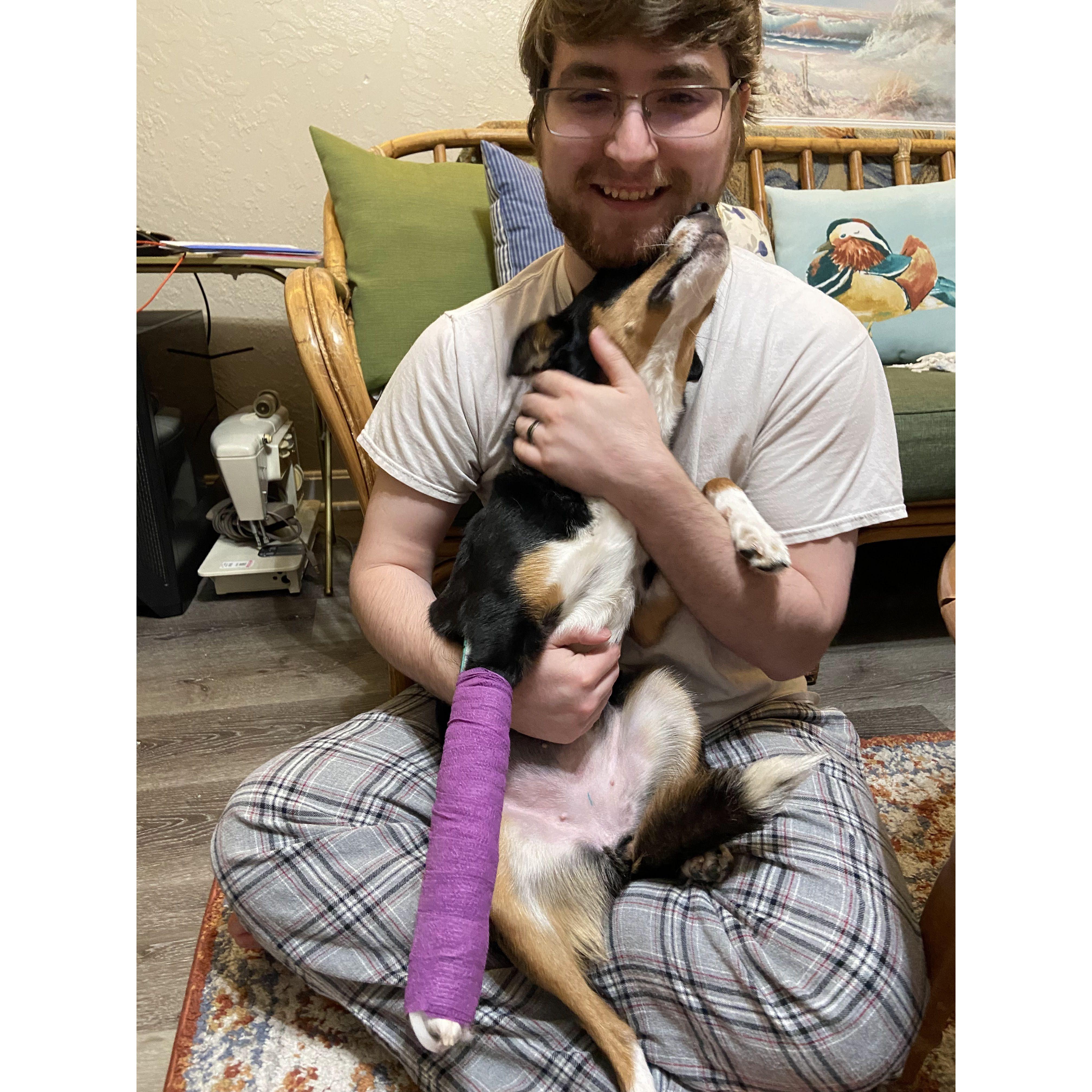 Collin and Millie helping Laramie learn bandage wrapping