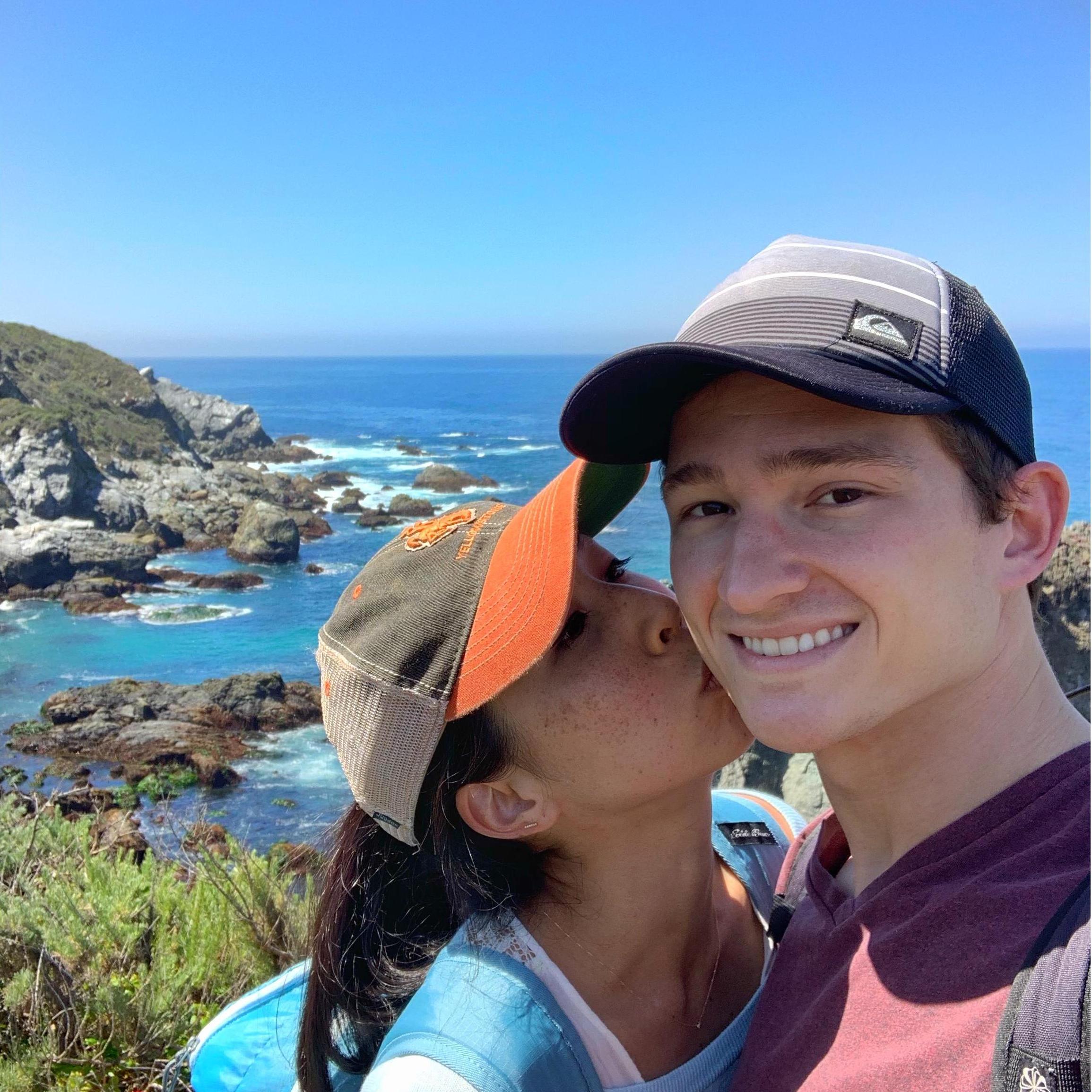 stealing a kiss in Half Moon Bay