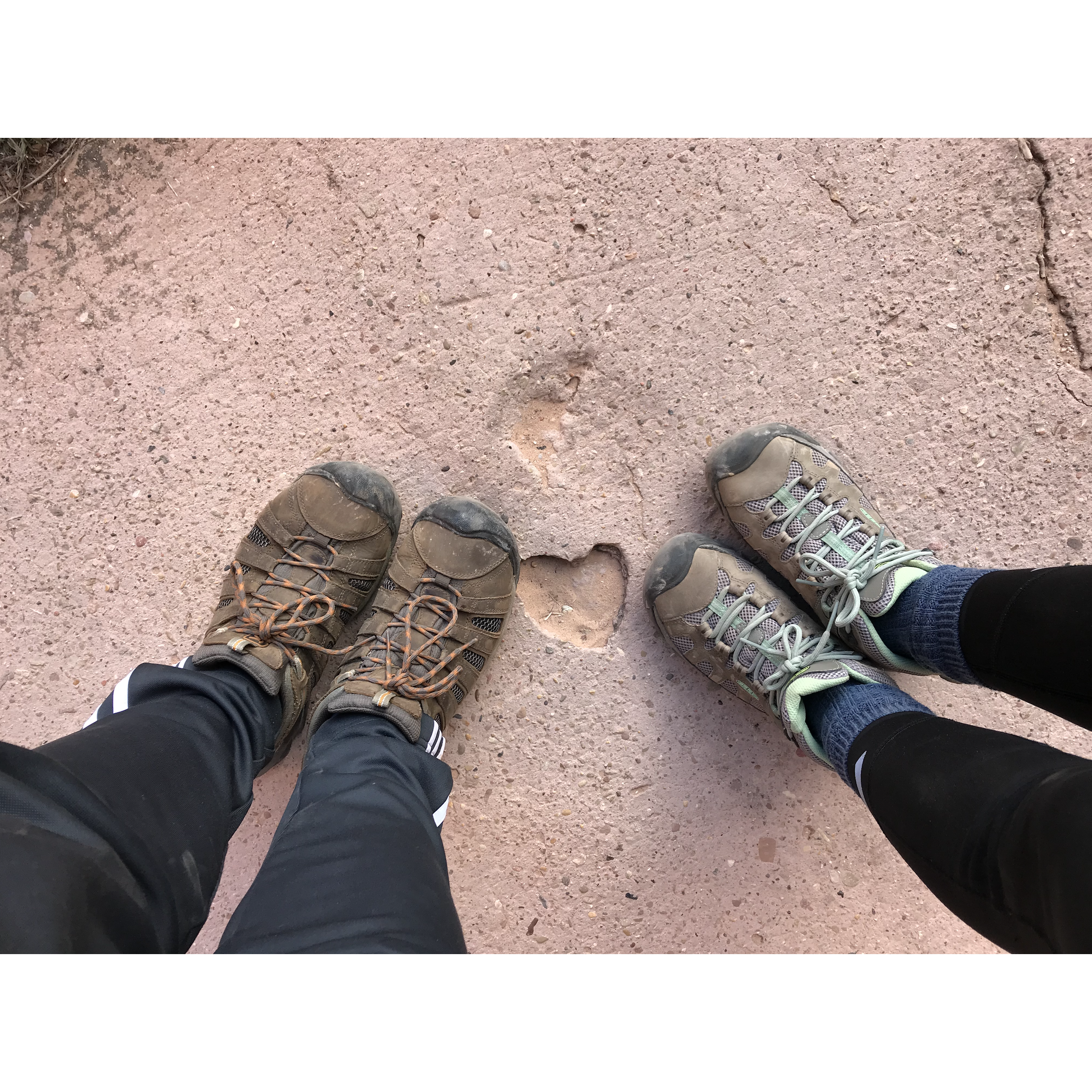 It's a heart in the ground. Of course someone had to stop to take a picture!