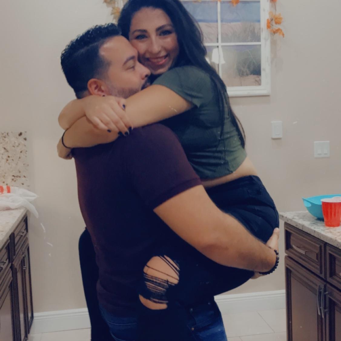 Getting some cuddles in at a friend’s fall party