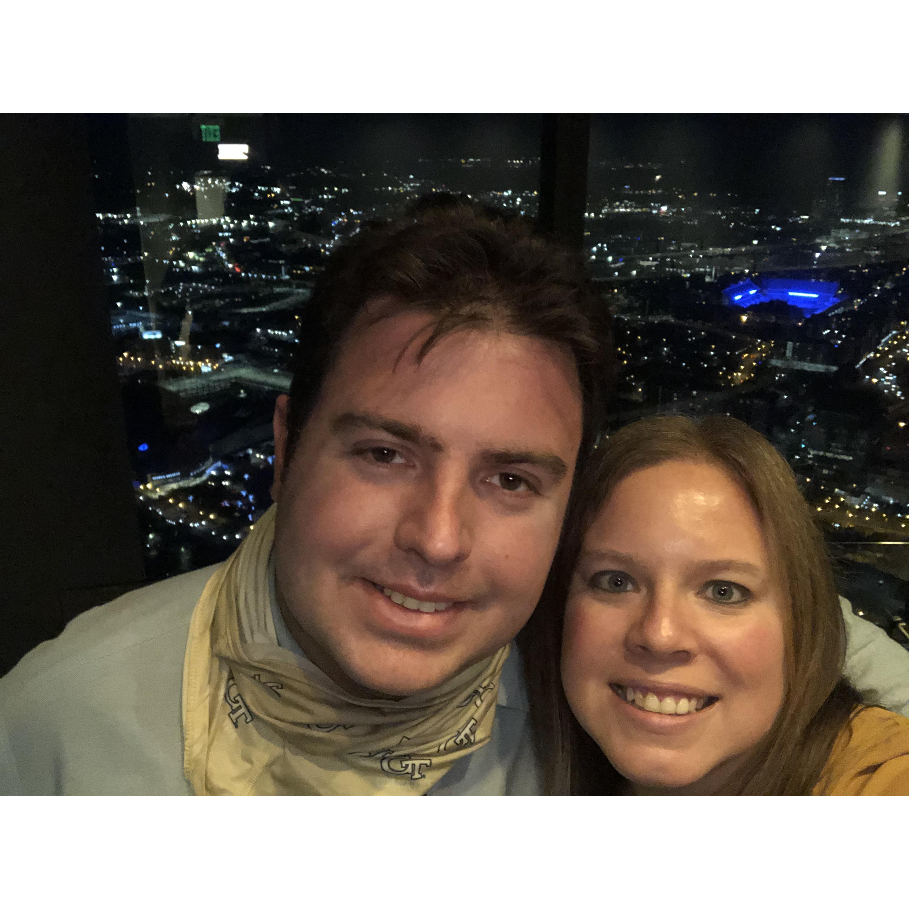 We celebrated our 1 year anniversary at the Sundial. P.S. Bobby Dodd Stadium is lit up in blue behind us!