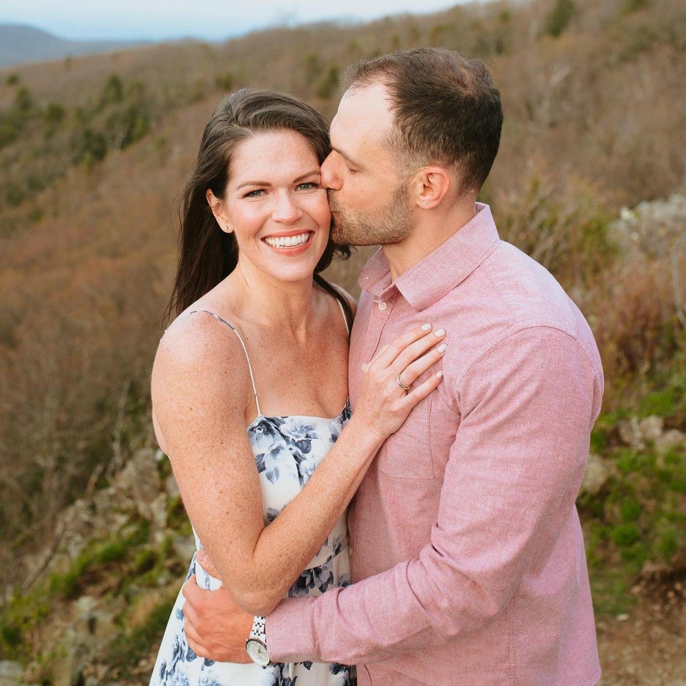 Engagement photo session at Shenandoah National Park with 50MPH gusts of wind at the summit of our favorite hiking trail.