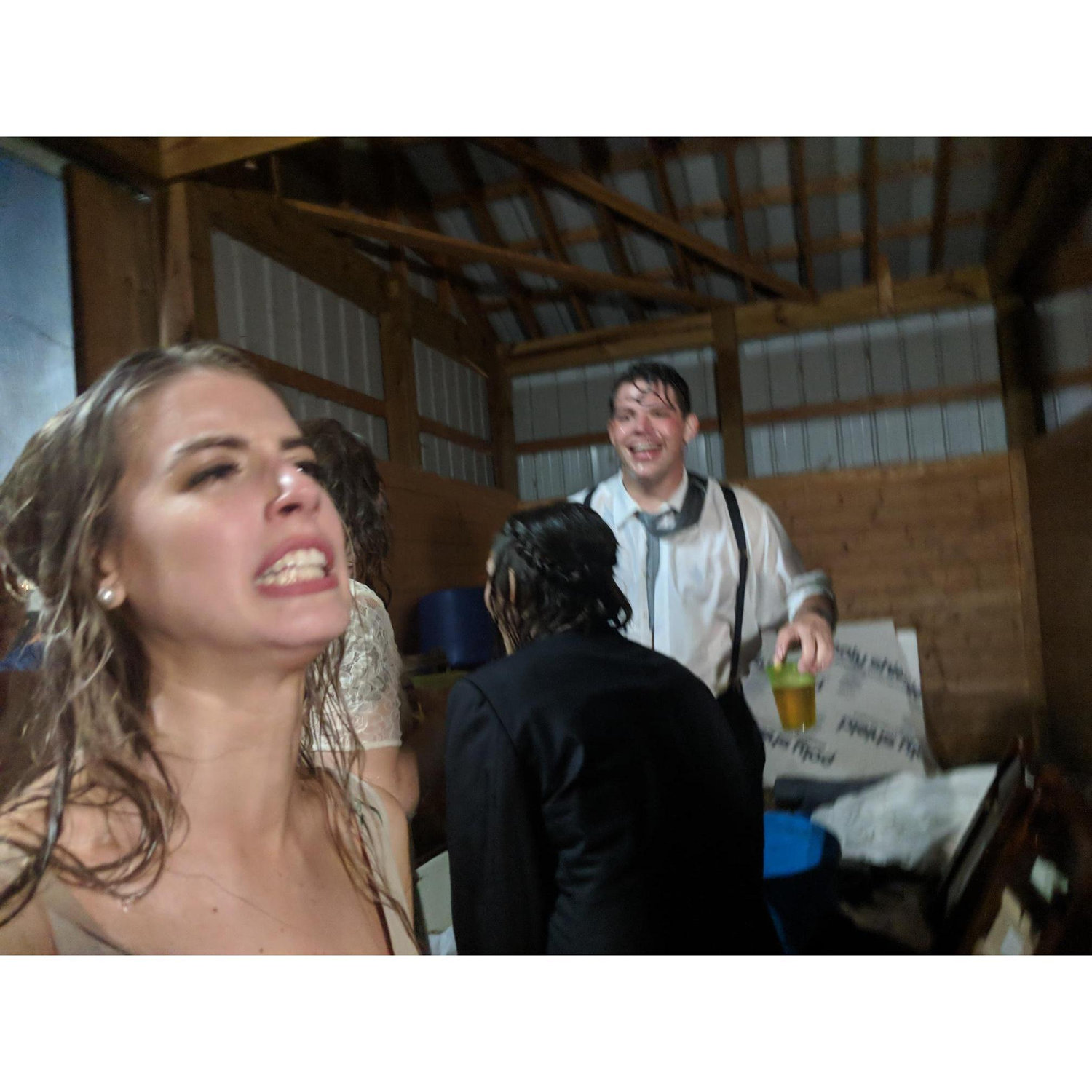 Stone's favorite picture of us. Stuck in a rainstorm at a friends wedding. 

Williamsburg, West Virginia - June 9, 2018