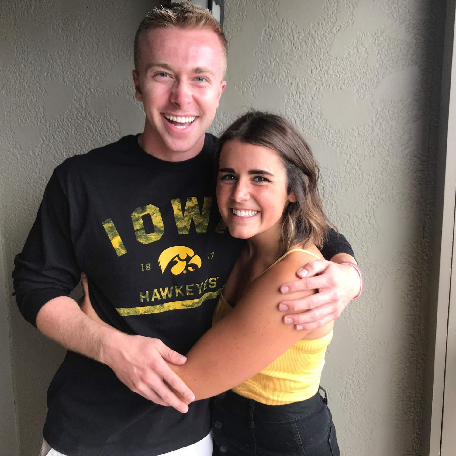 1st picture together! 1st time jake meets some of katie’s fam! 1st (and last) time jake buys IA hawkeyes tshirt at Walmart!