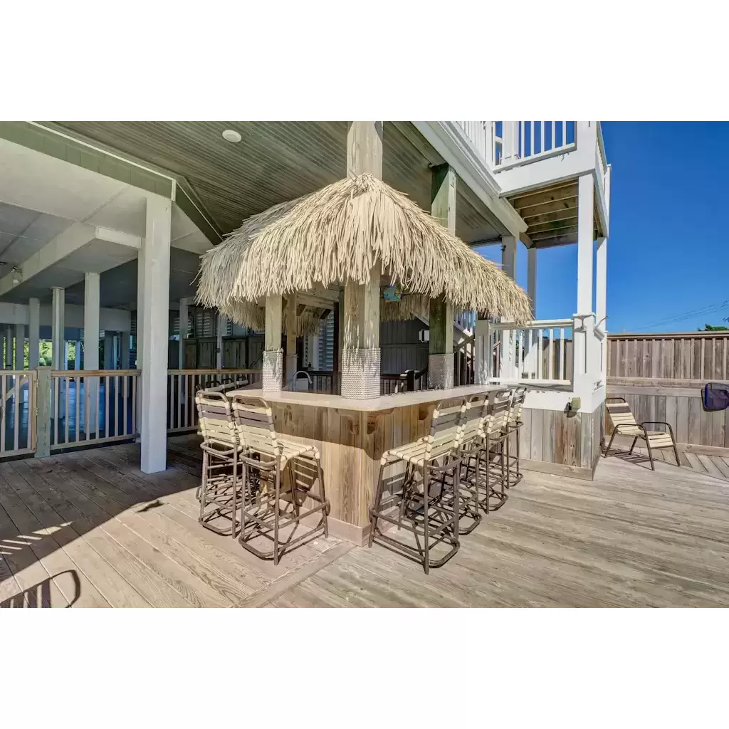Refresh your bevies at the tiki bar.