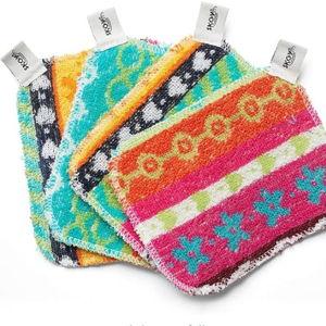 Skoy Scrub, 4-Pack Reusable, Non-Scratching Dish Scrubber for Kitchen and Household Cleaning, Planet-Friendly, Dishwasher Safe Soft Scrub, Assorted Colors and Designs