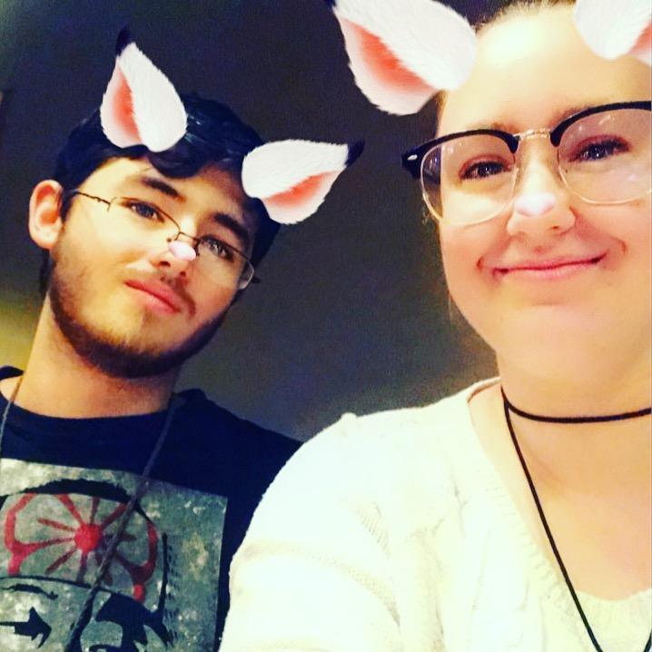 Josh loves me enough to let me put kitty ears on him.