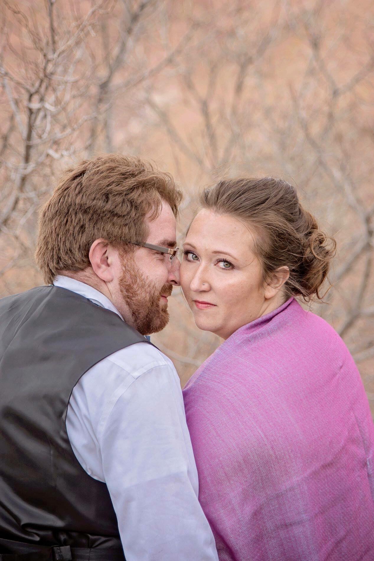 Engagement photos at Red Rocks courtesy of Becca Romine with Feathered Penny Photography