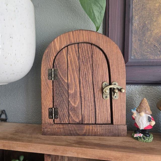 Round fairy door with opening latch