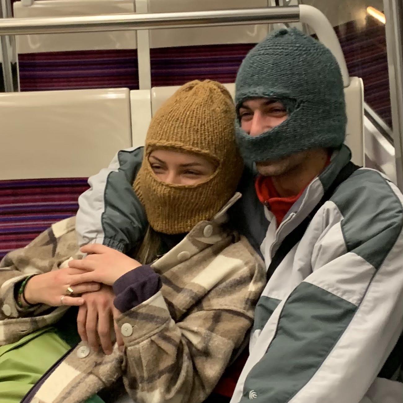 February 2022: Our first photo taken together in the Paris metro. Daniel made these beanies!!