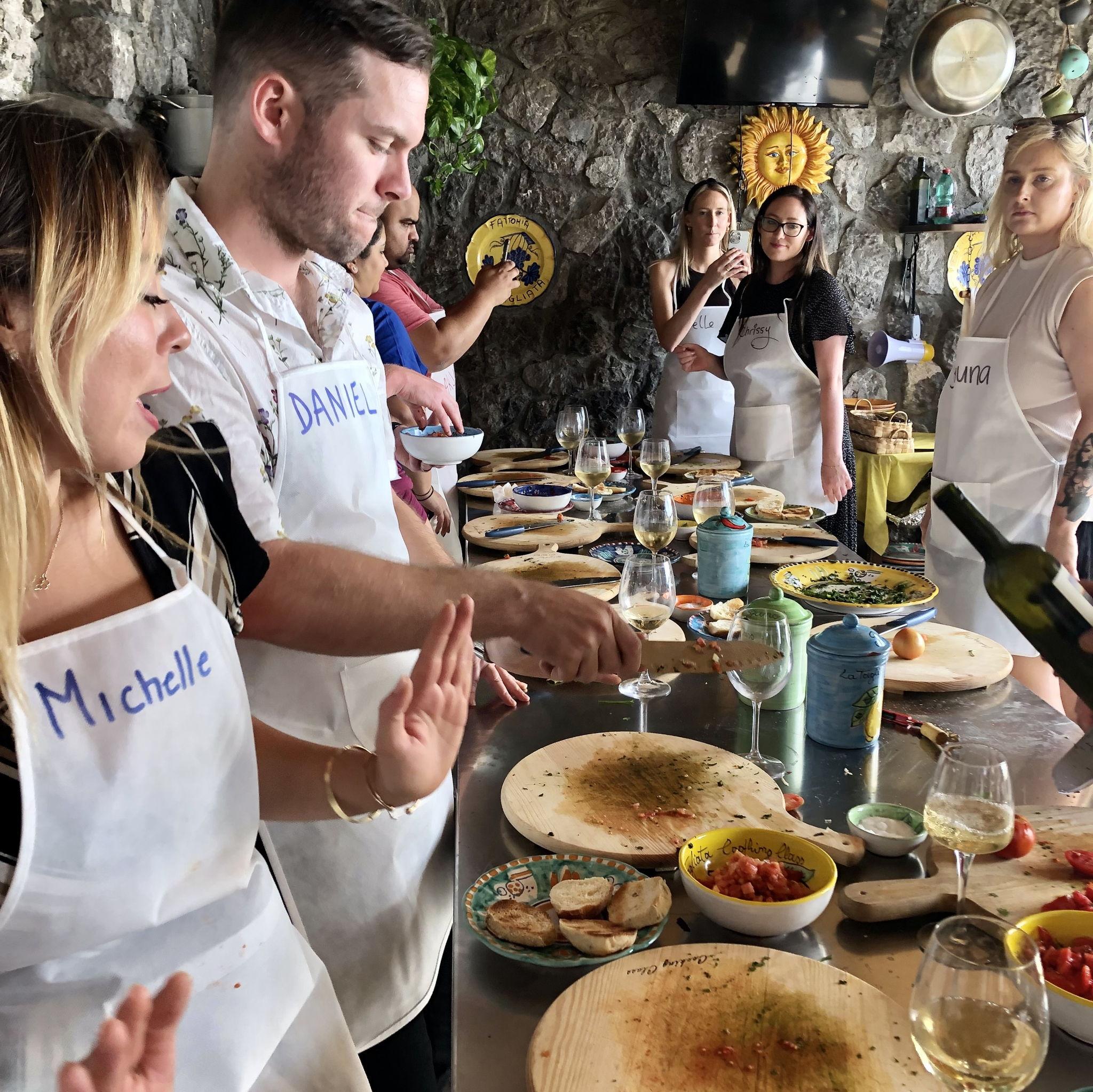 Dancing to our own beat during a cooking class on the Amalfi Coast