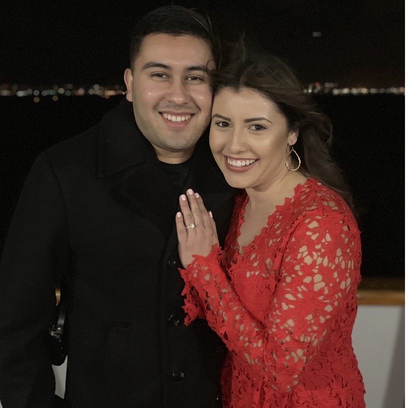 Celebrating our engagement the night after with a San Diego harbor cruise.
