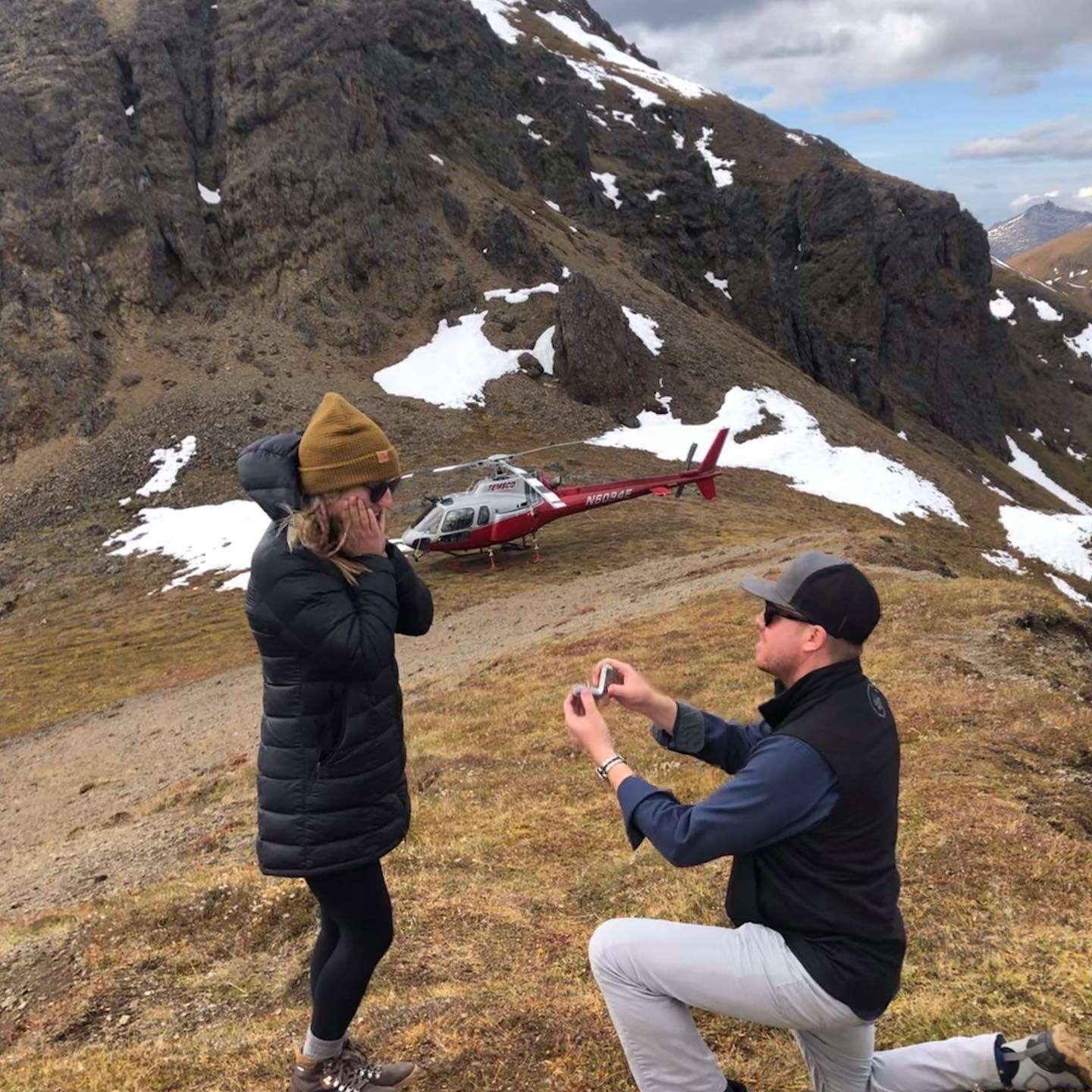 Keith popping the question on a mountain top in Alaska!
