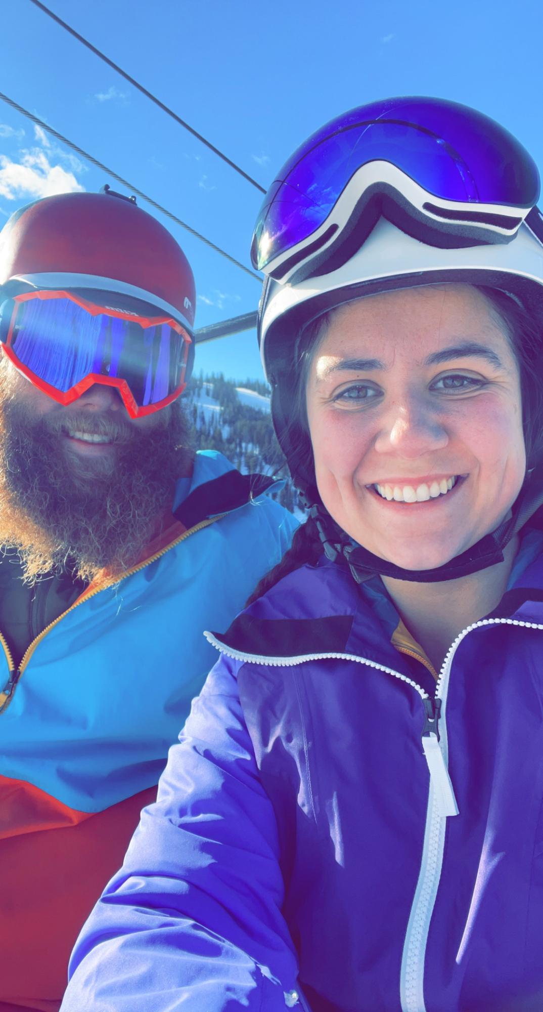 Devin teaching Bella how to snowboard winter 2022