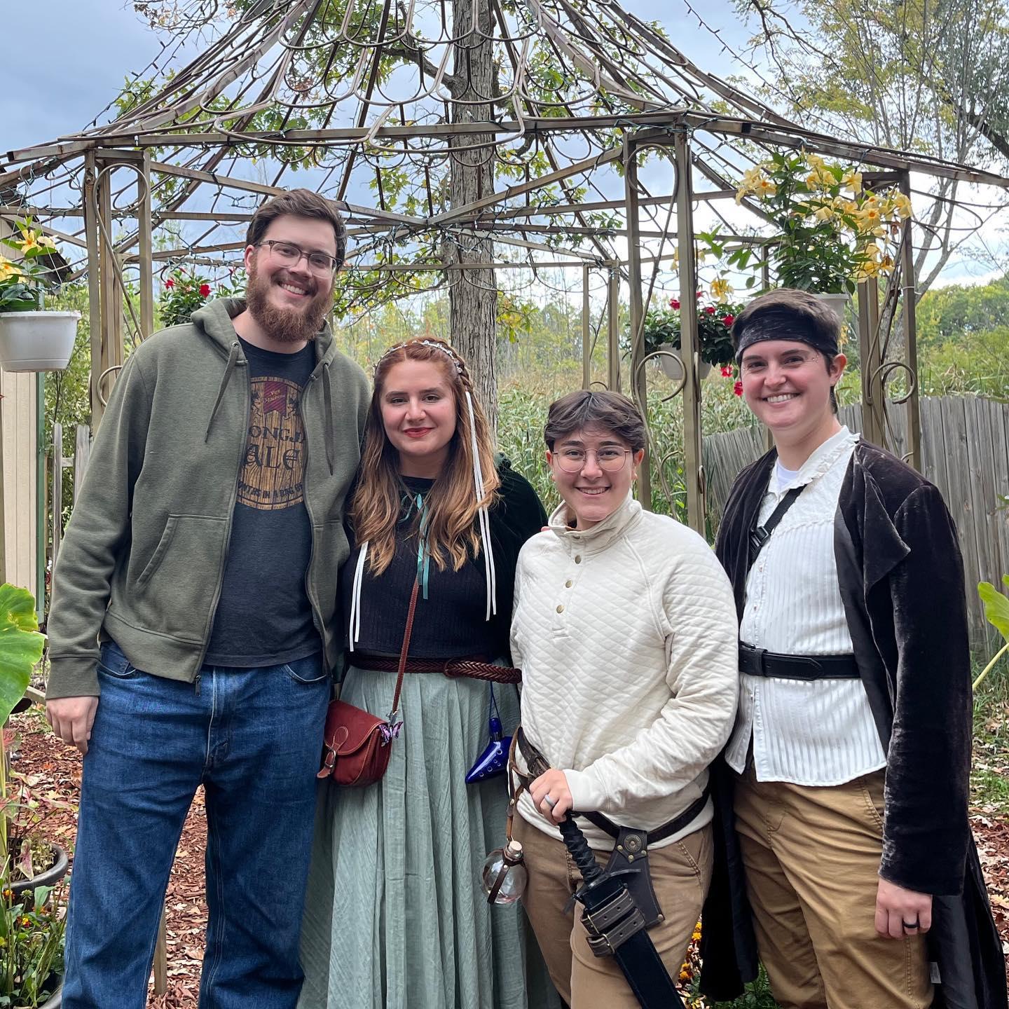 From left to right; Daniel in his civvies, Presley as an elvish princess, Emily in padded armor with a sword and potion bottle, and Benny as a pirate