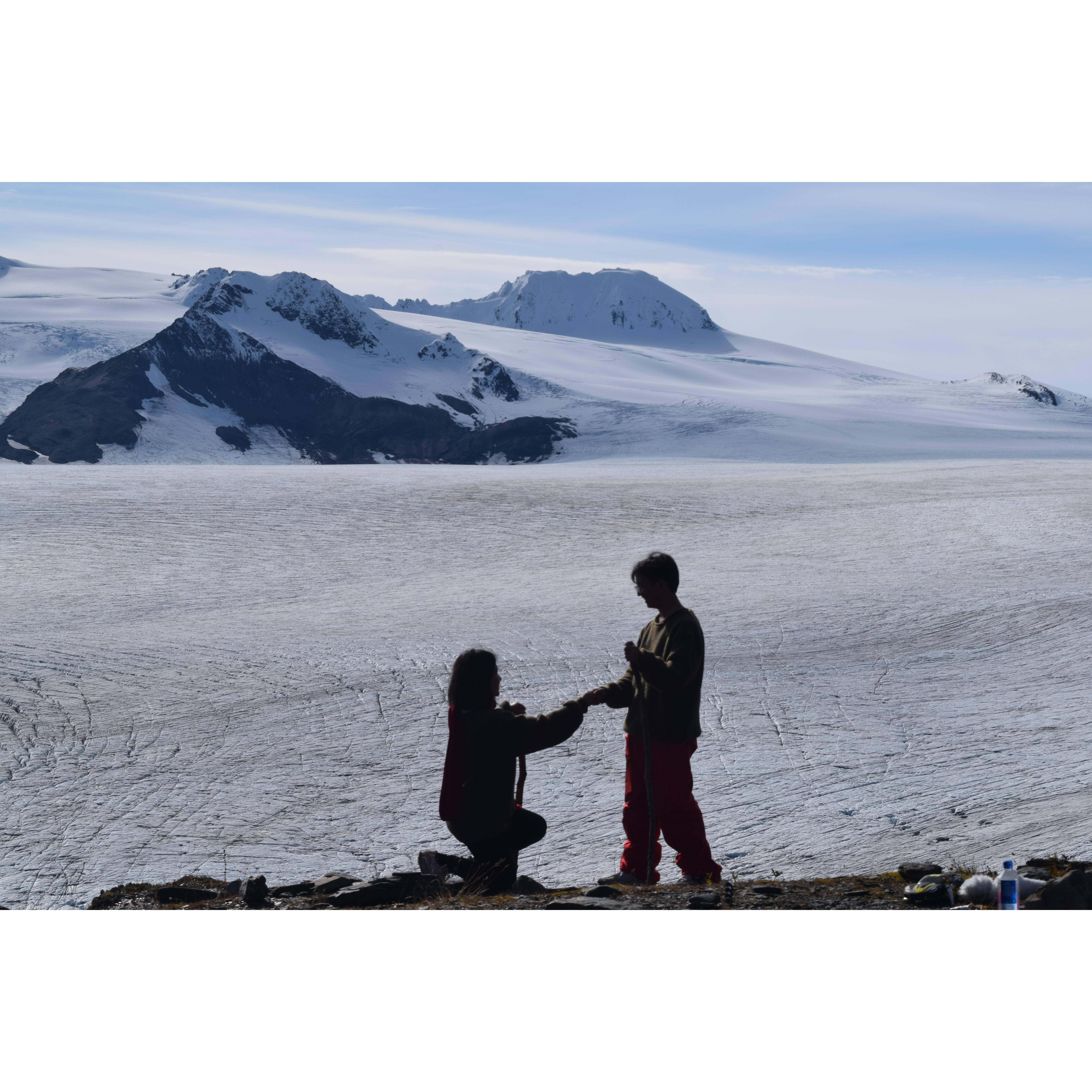 Tutu proposed to Bing at the summit of the snow-capped mountain.