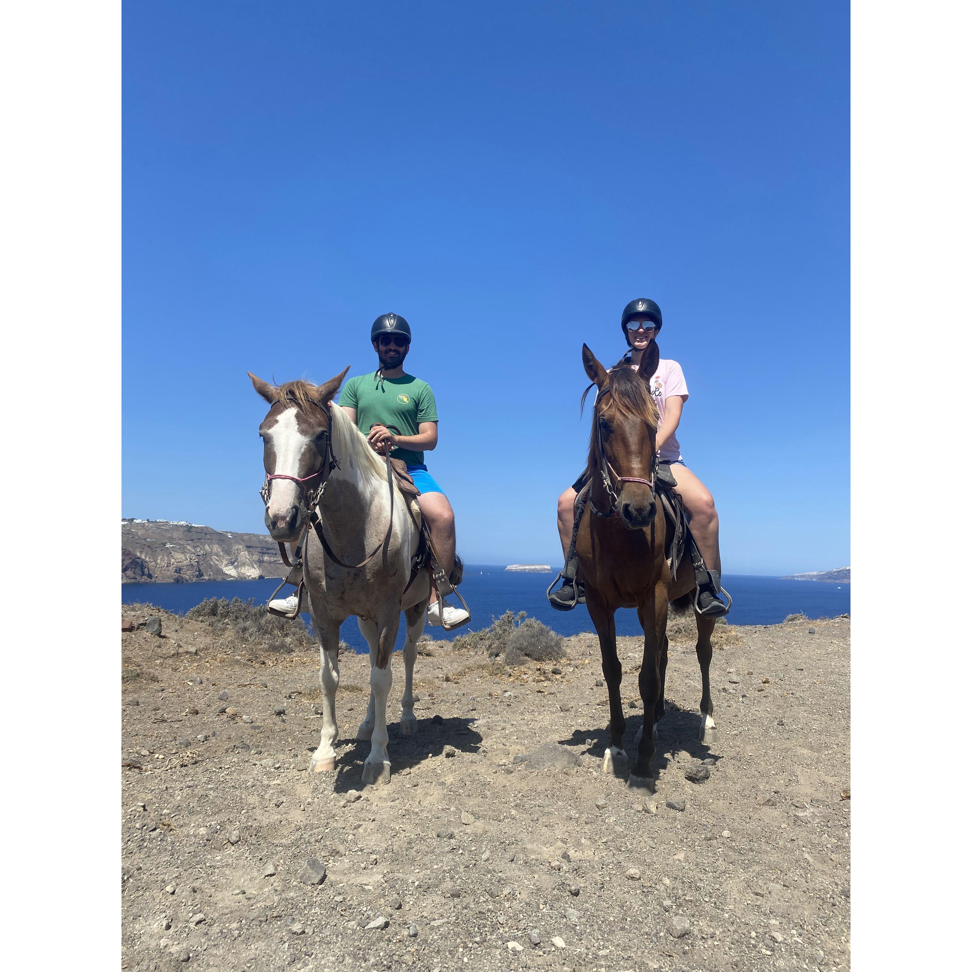 Tom's first time riding a horse and our first time in Santorini