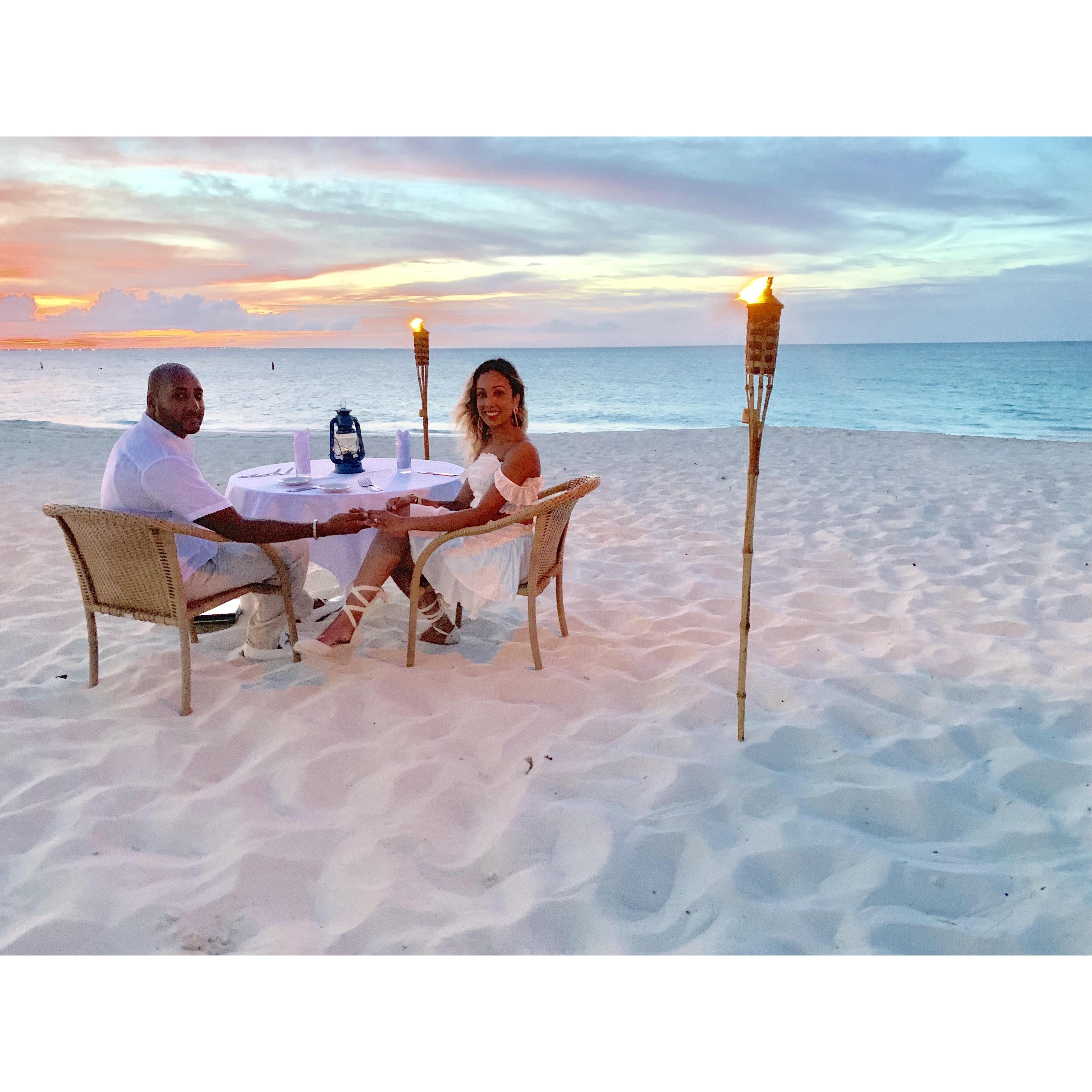 Dinner on the beach in Turks & Caicos, right after being newly engaged!