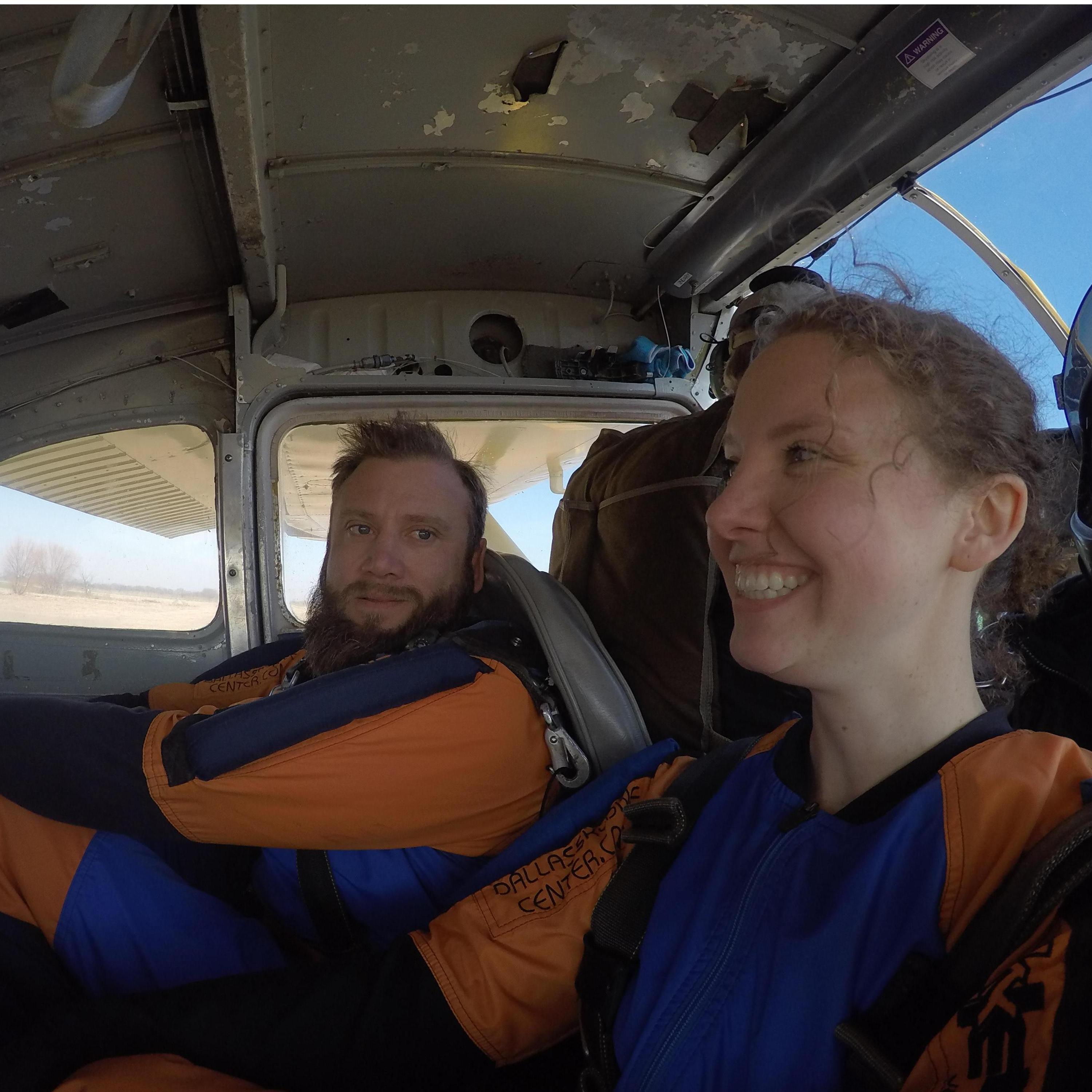 Russell contemplates jumping out of a plane.