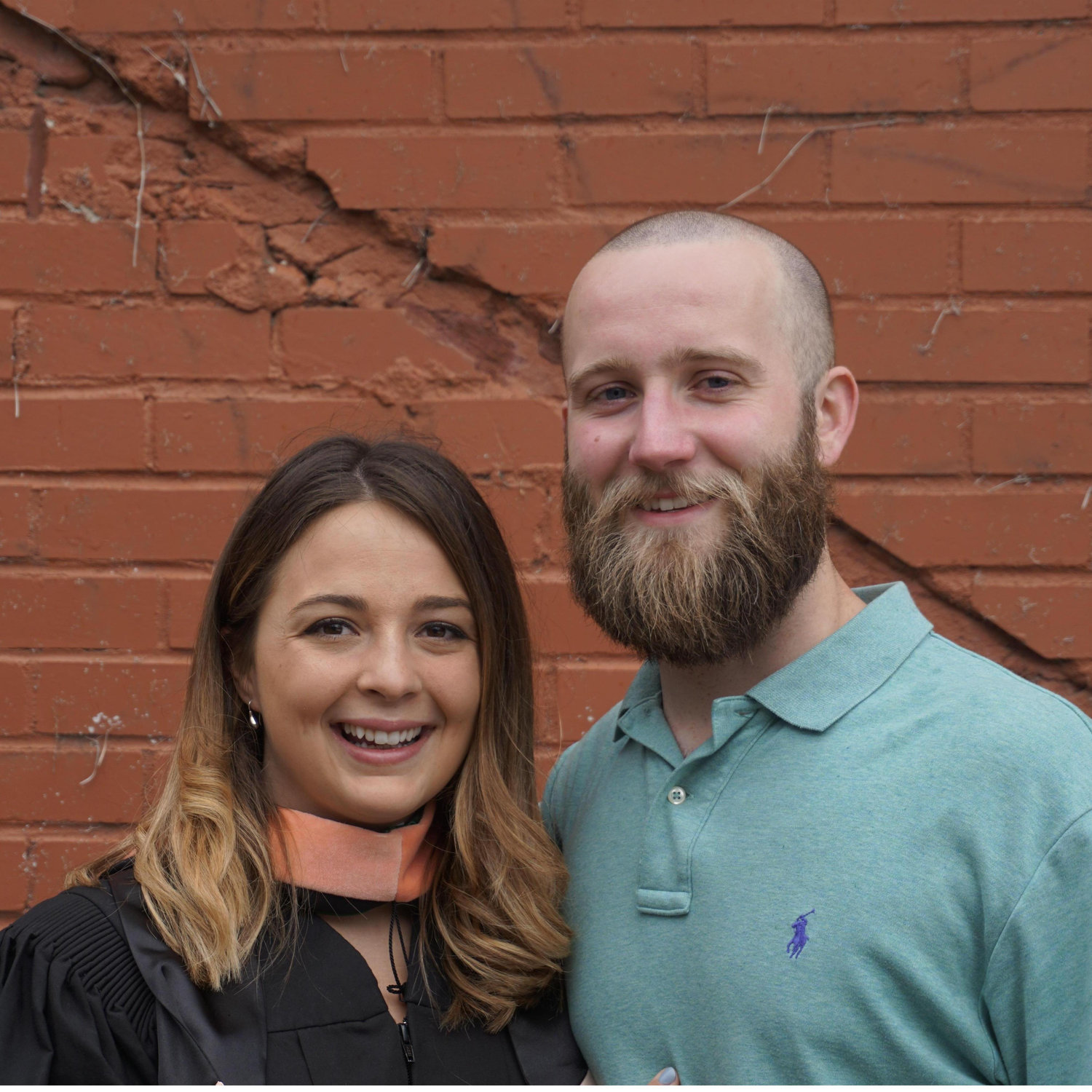 My #1 supporter with me at my masters graduation