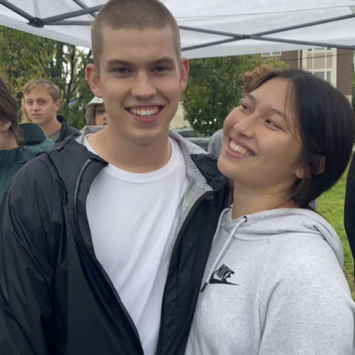 Jared had just buzzed all of his hair off for a cancer fundraiser. Elana is admiring his new look :)