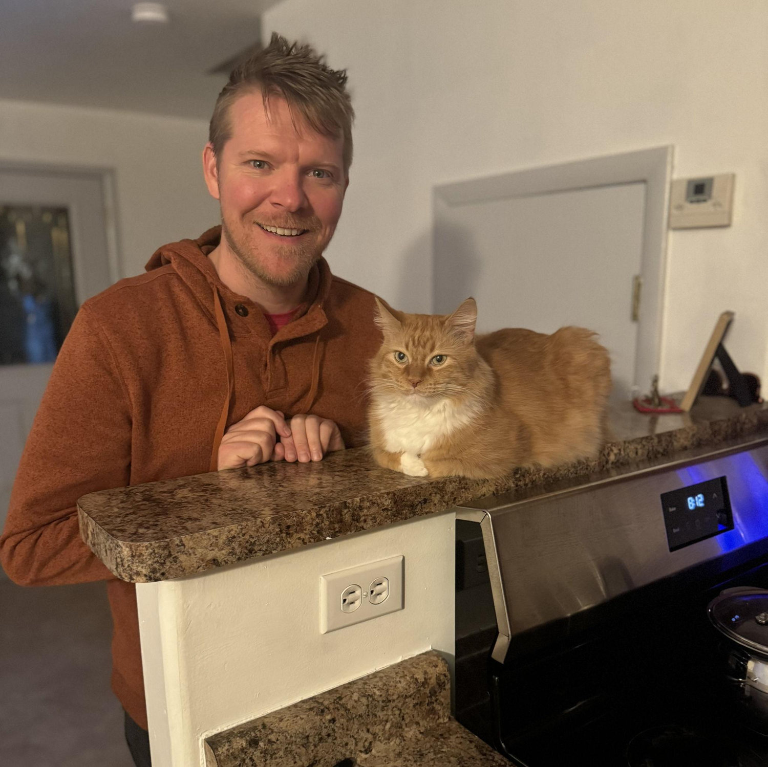 Eric and our cute cat, King