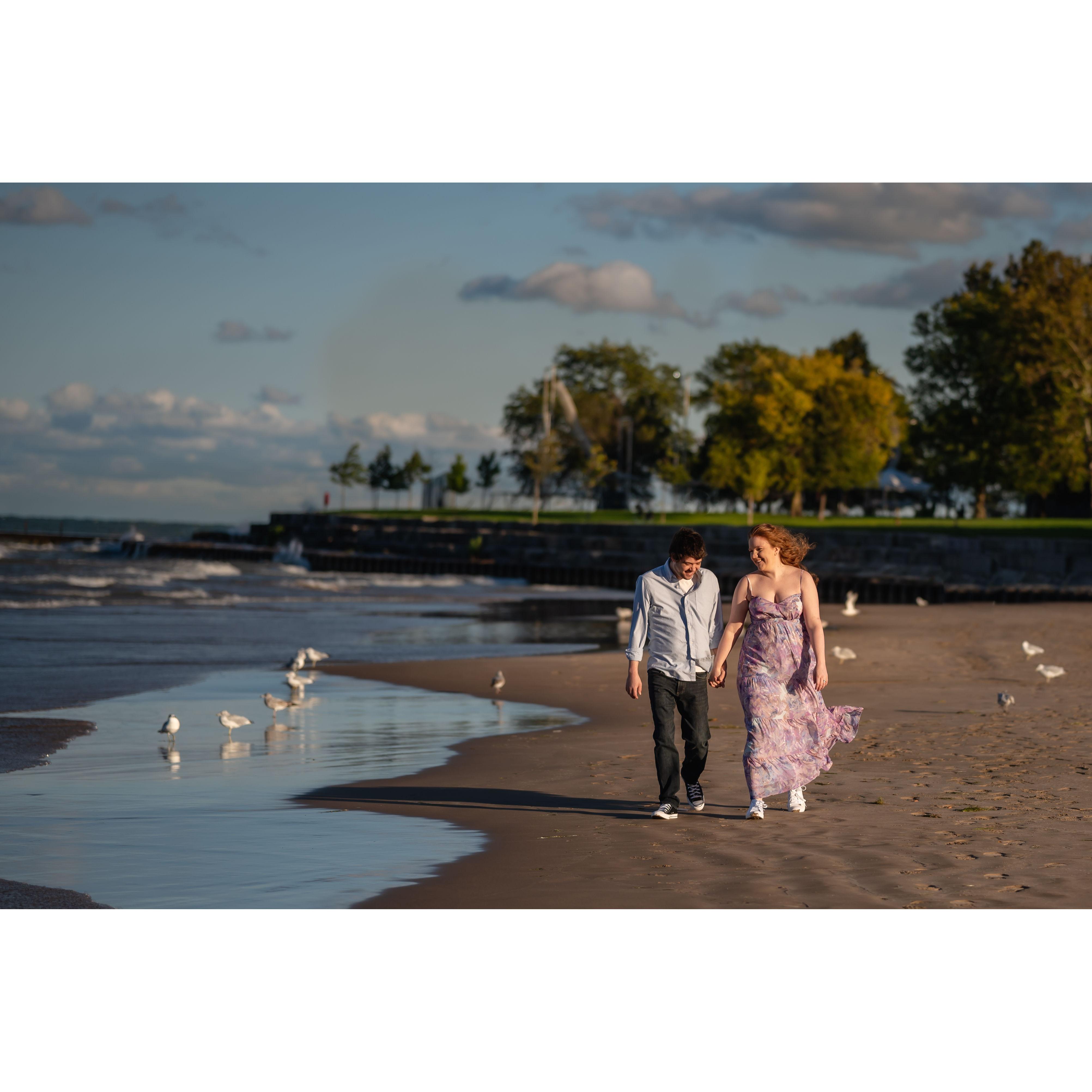 Walking on Foster Beach in Chicago, where we got engaged on 12/24/21.