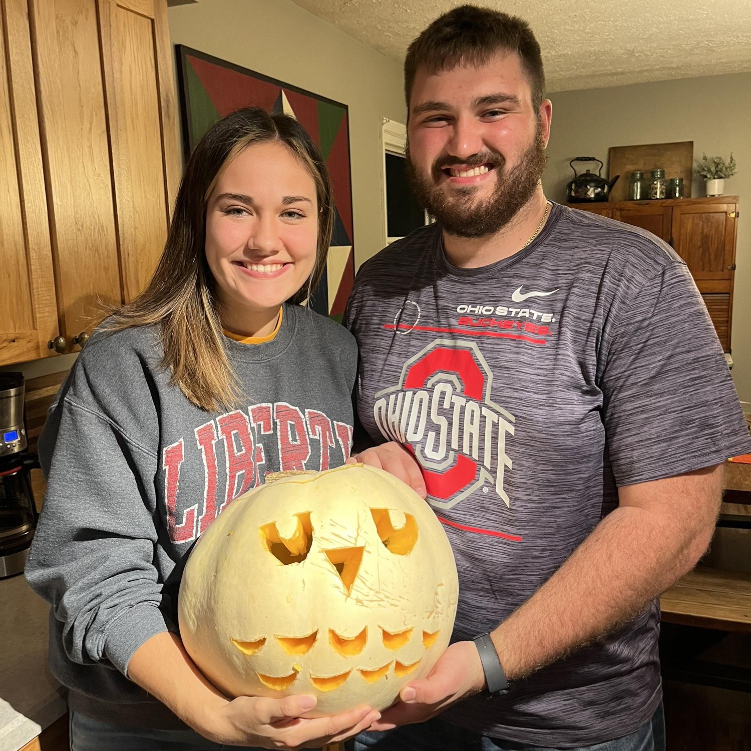 Raegan had completely lost her voice, so instead of the planned date for that night, Isaiah came over to carve pumpkins!