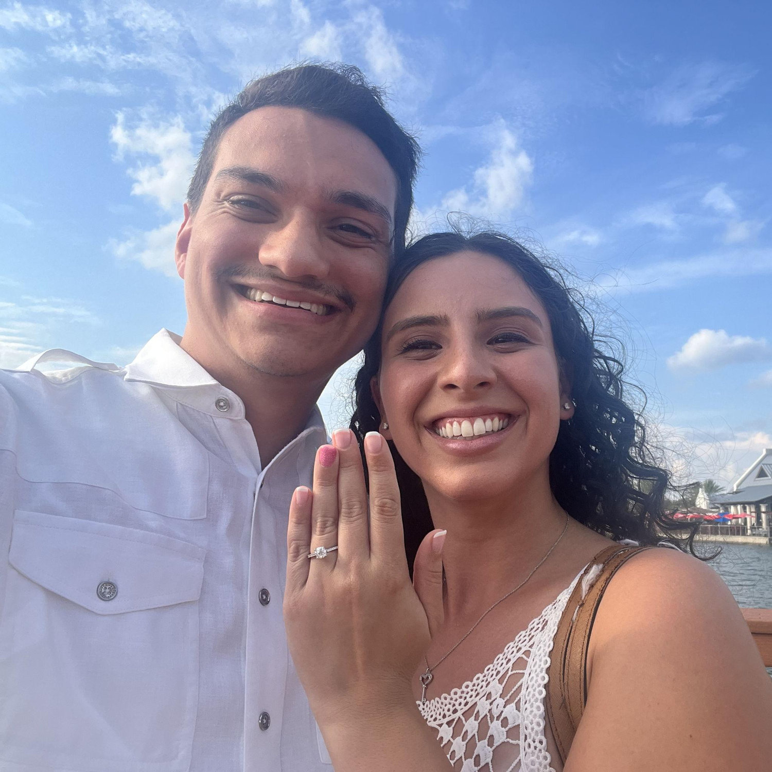 Showing off the ring.