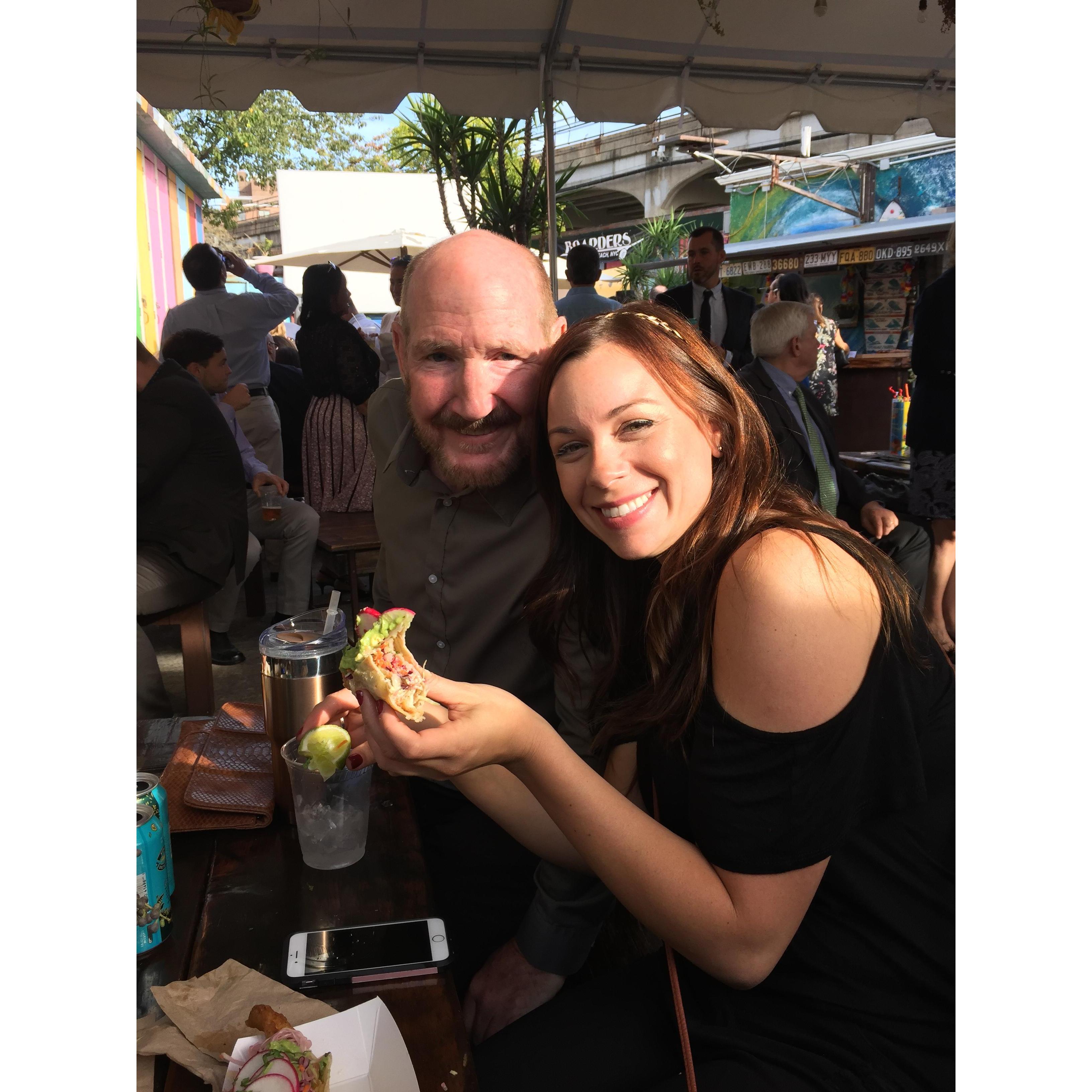 Paul & Lindsey sharing tacos and laughs.